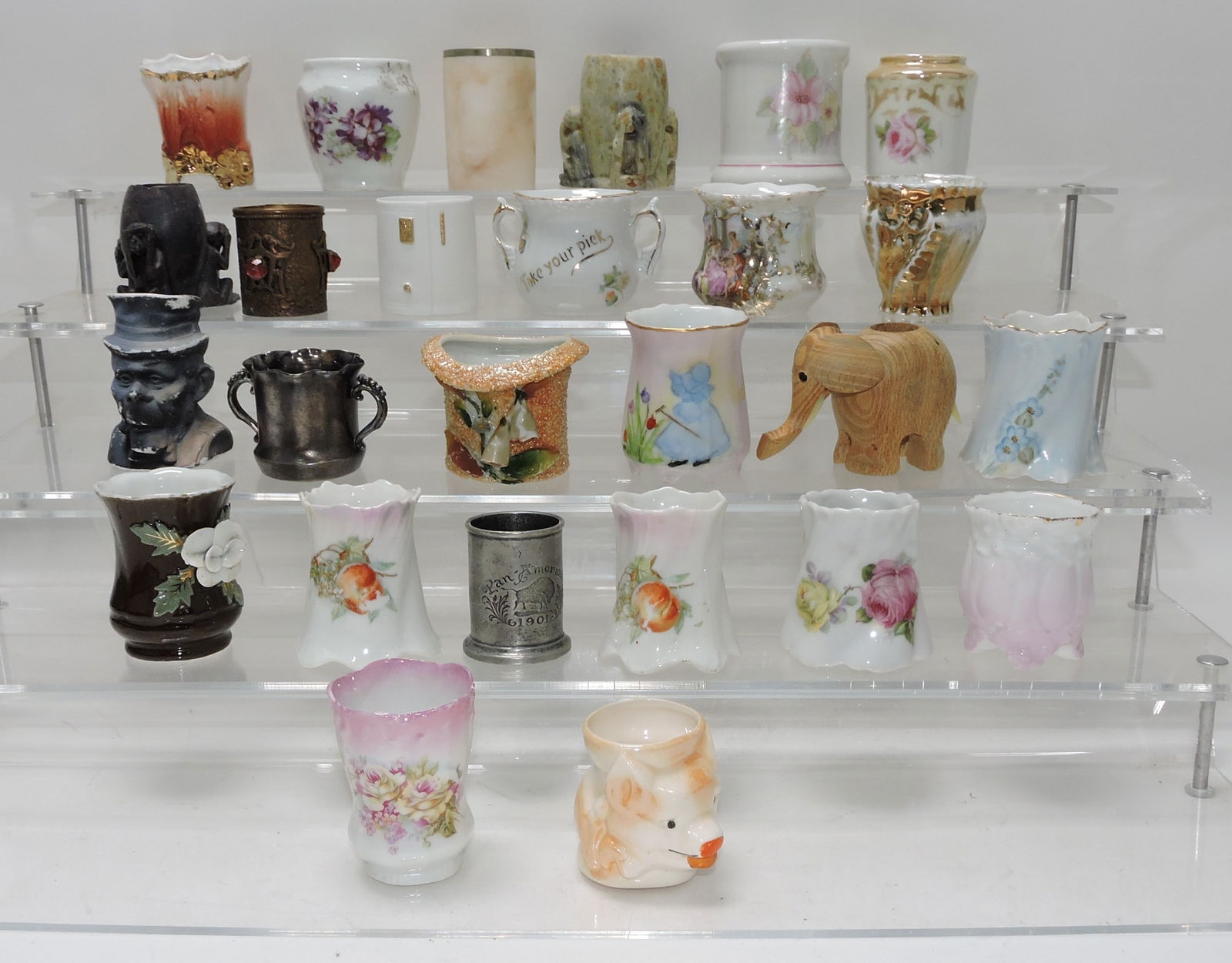 Lot of 26 toothpick holders: .