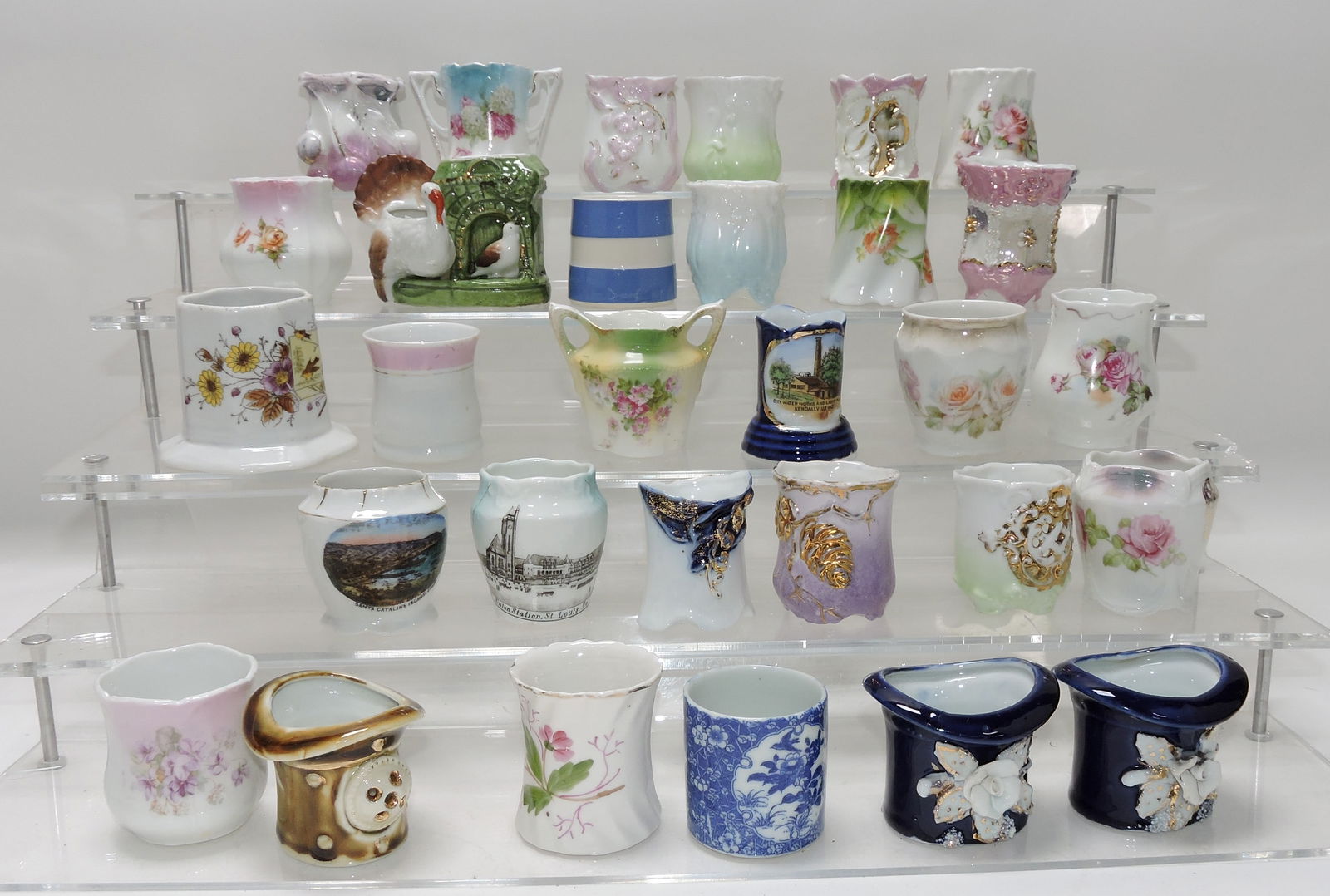 Lot of 30 toothpick holders: .