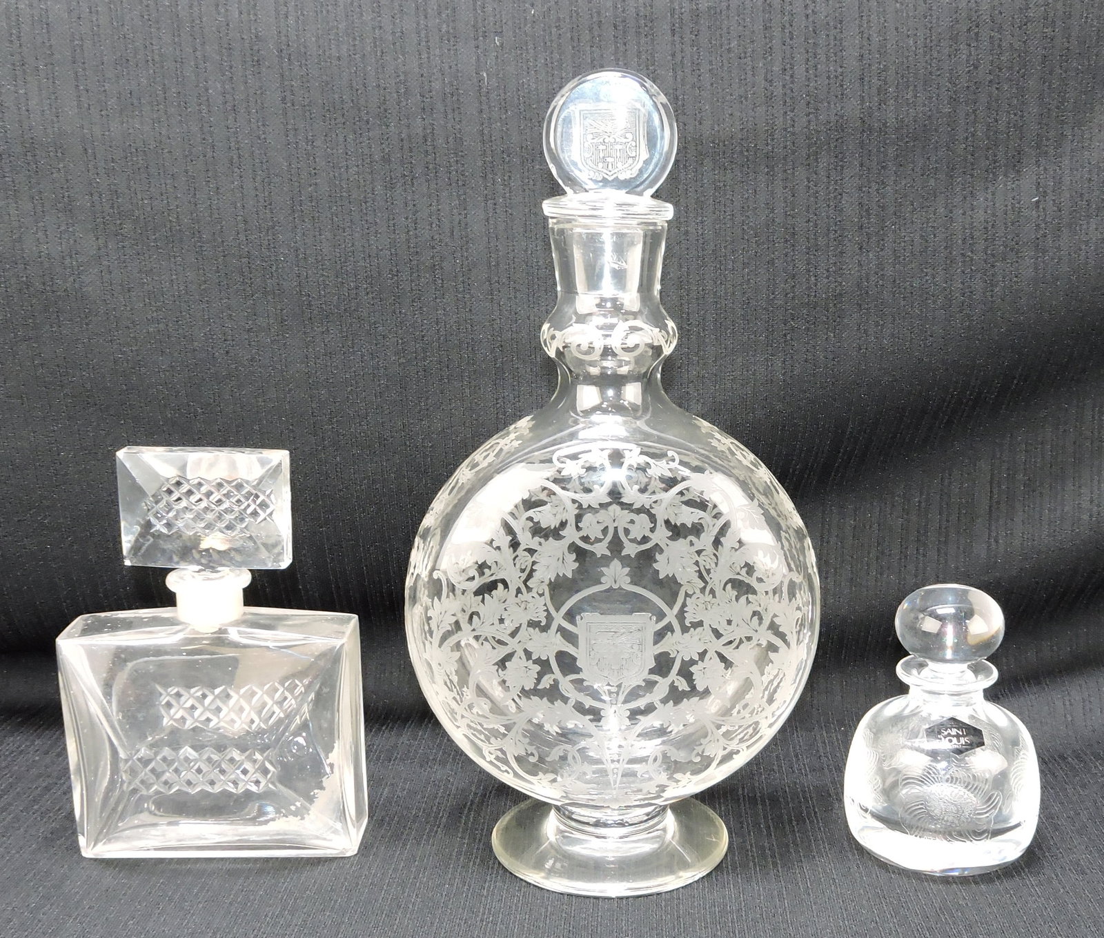 Lot of 3 perfume bottles: 2 Baccarat and: 1 St. Louis, 3 1/2" to 10 1/2"