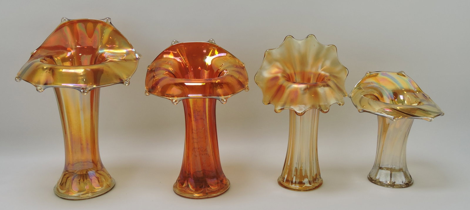 Marigold carnival glass lot of 4 jack in: the pulpit vases, 7 to 11"