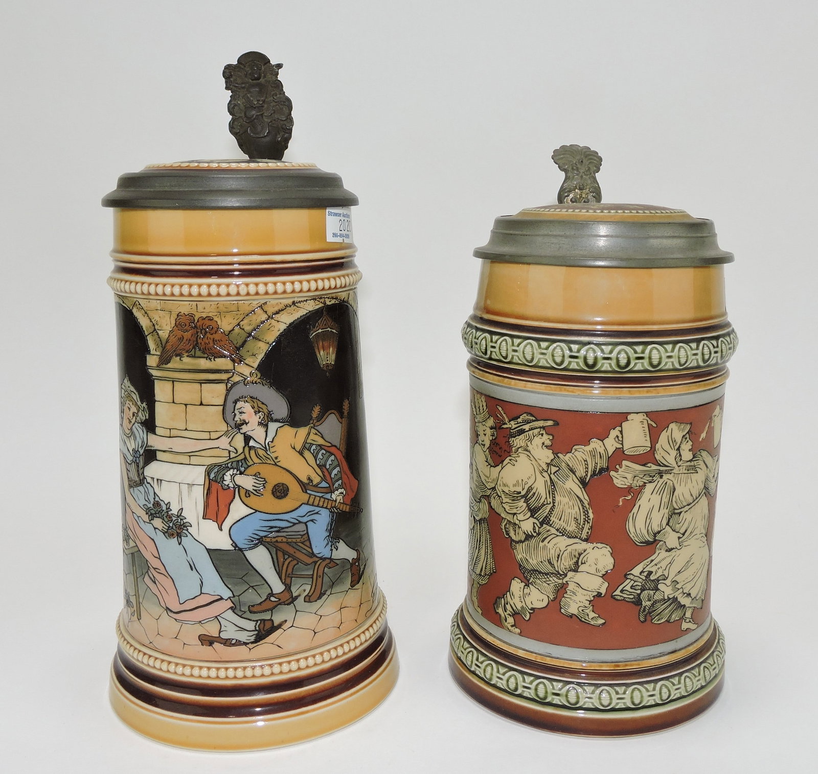 Mettlach lot of 2 steins, #2780 1/2L,: guitar player AND #2057 1/2L, peasant dance