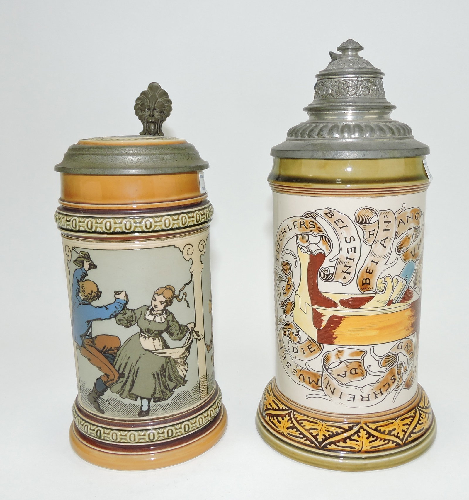 Mettlach lot of 2 steins, #1162 1/2L,: people dancing AND #2721 1/2L, occupational cabinet maker