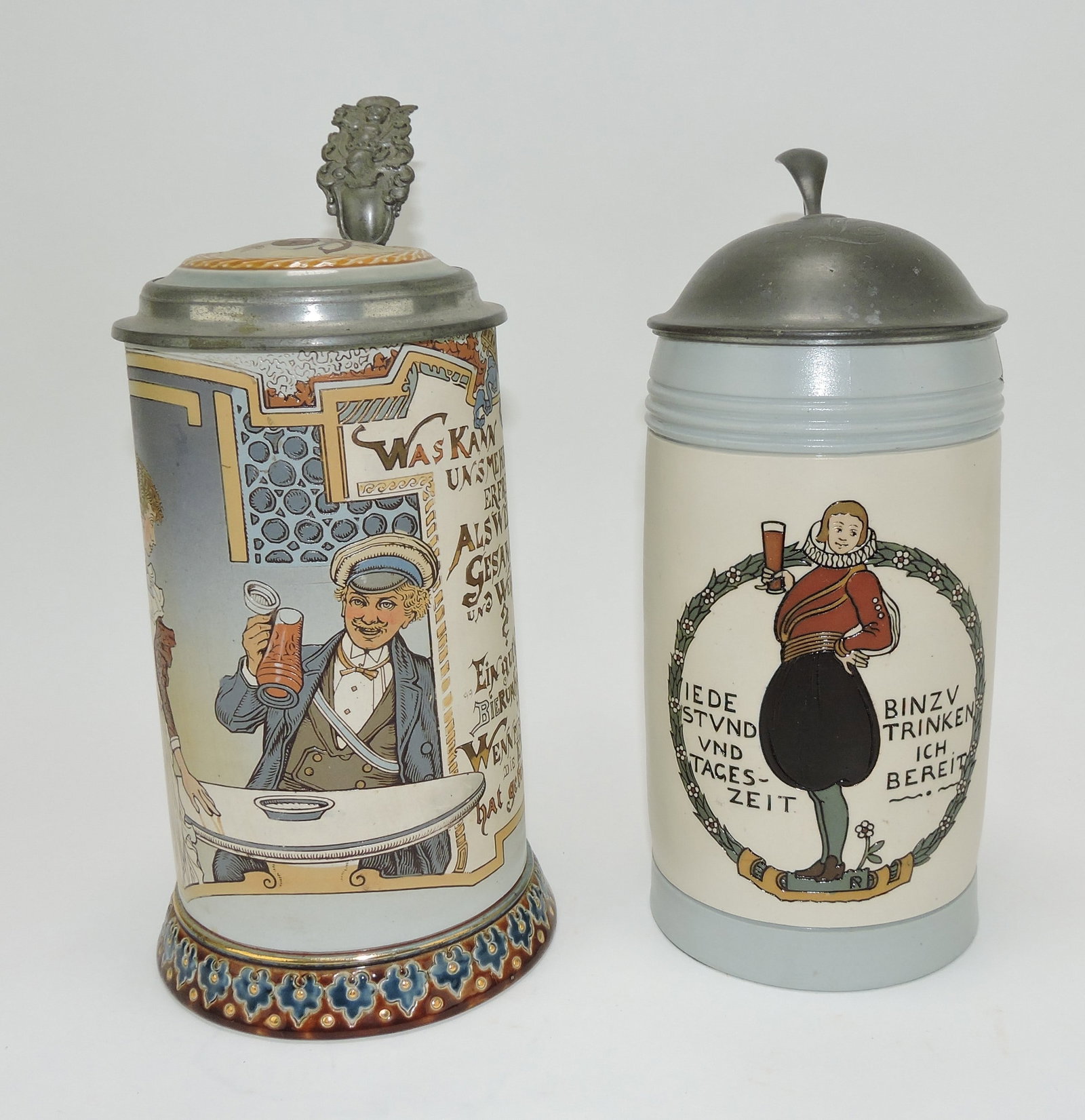 Mettlach lot of 2 steins, #2520 1L,: student drinking AND #3004 1L, man toasting