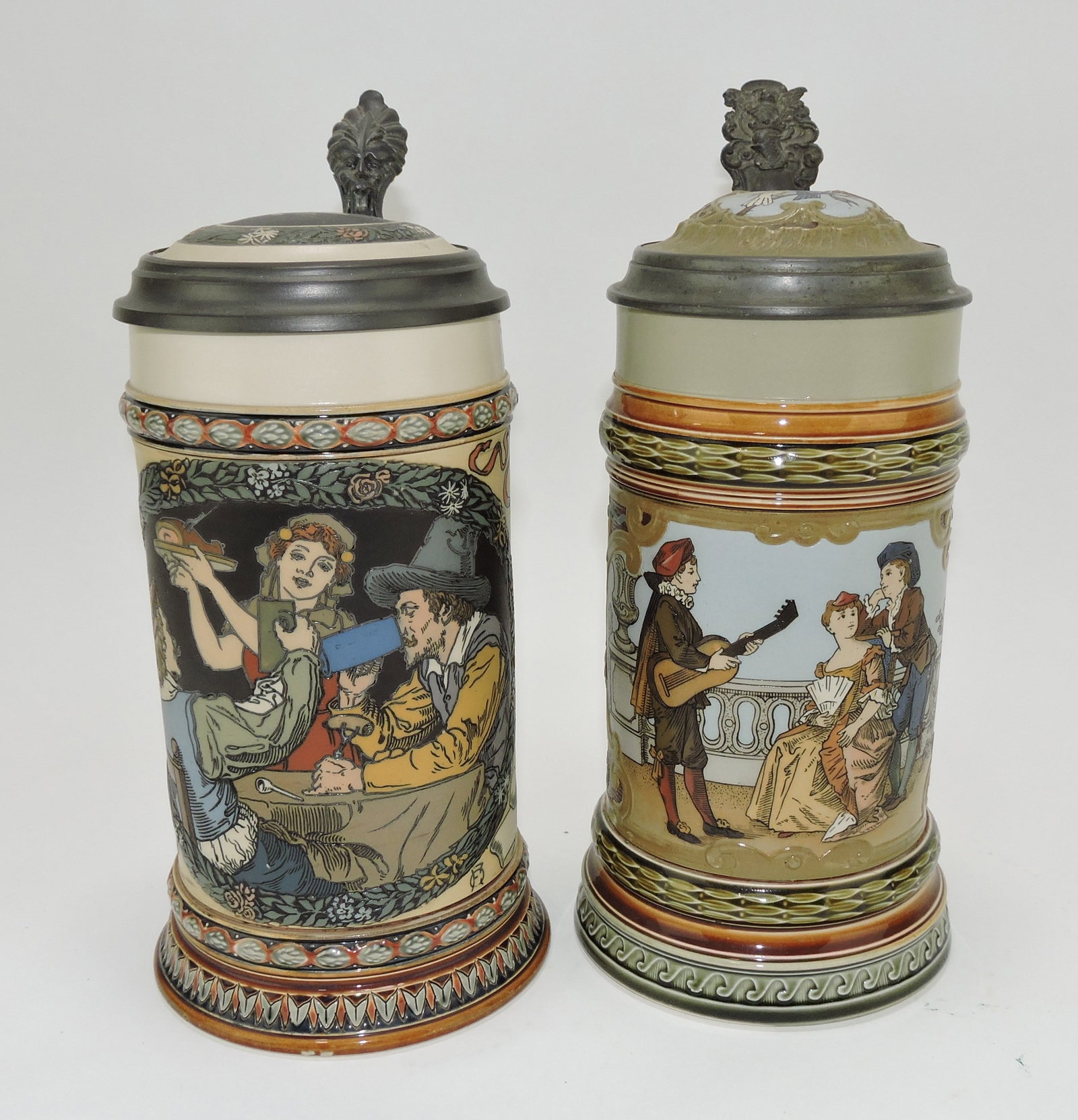 Mettlach lot of 2 steins, #2716 1L,: Festive AND #2285 1L, Guitar player