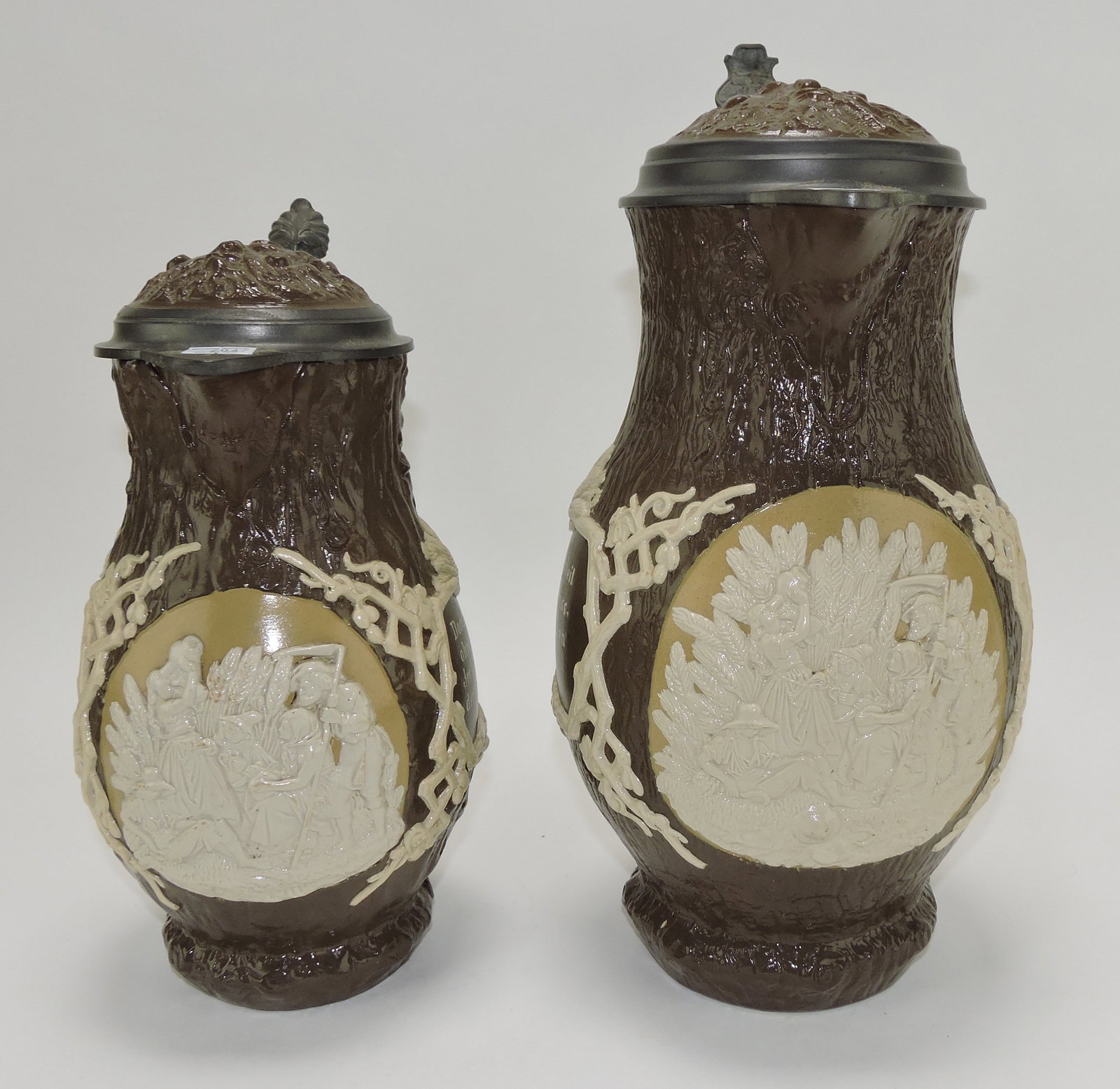 Mettlach lot of 2 steins, #1028 4L and: #1028 2L, tree trunk with relief