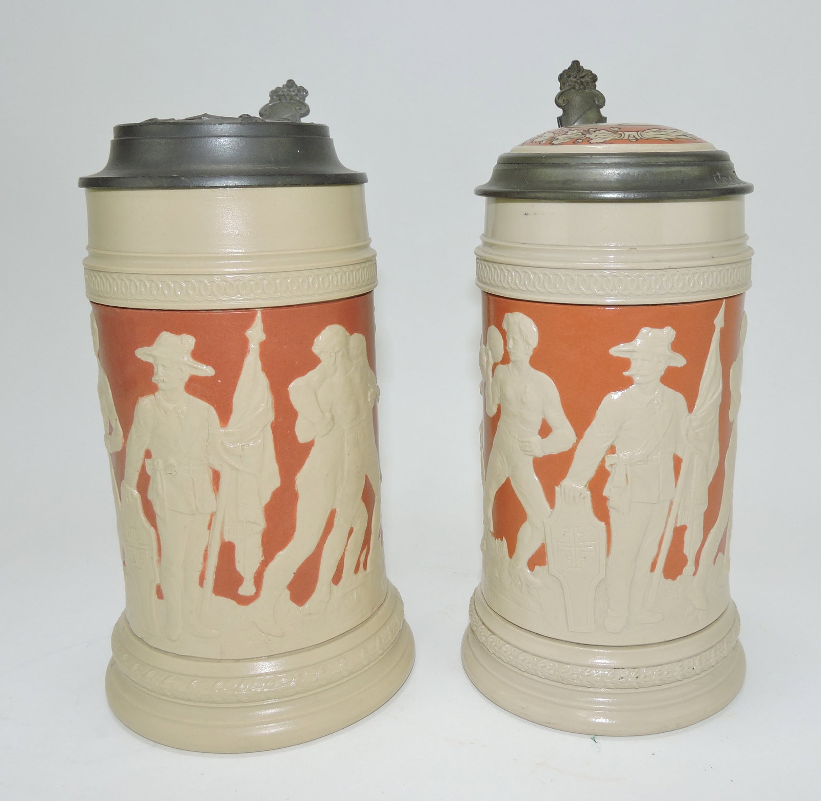 Mettlach lot of 2 1/2 liter steins with: sports/military scenes