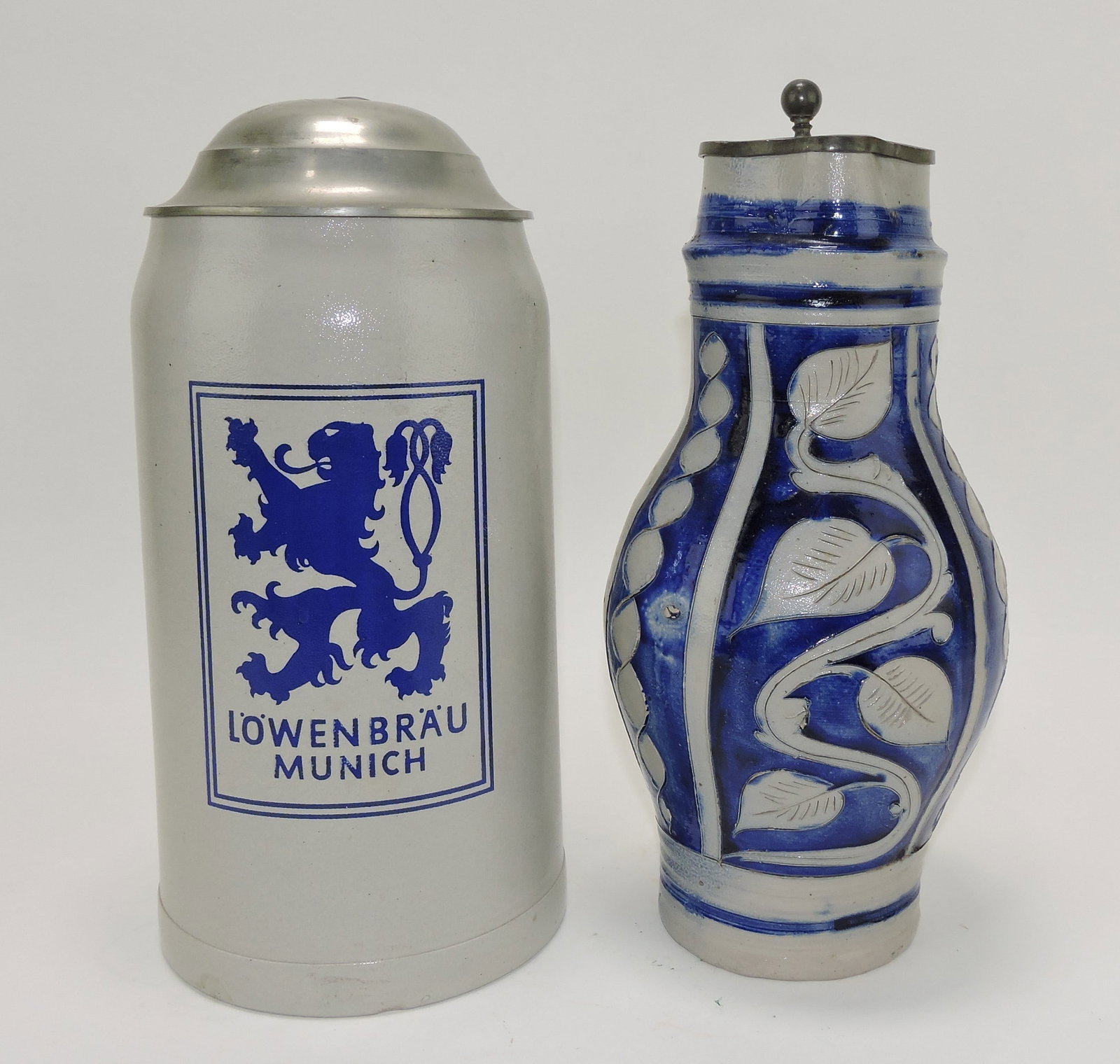 Lot of 2 large stoneware steins, 12": .