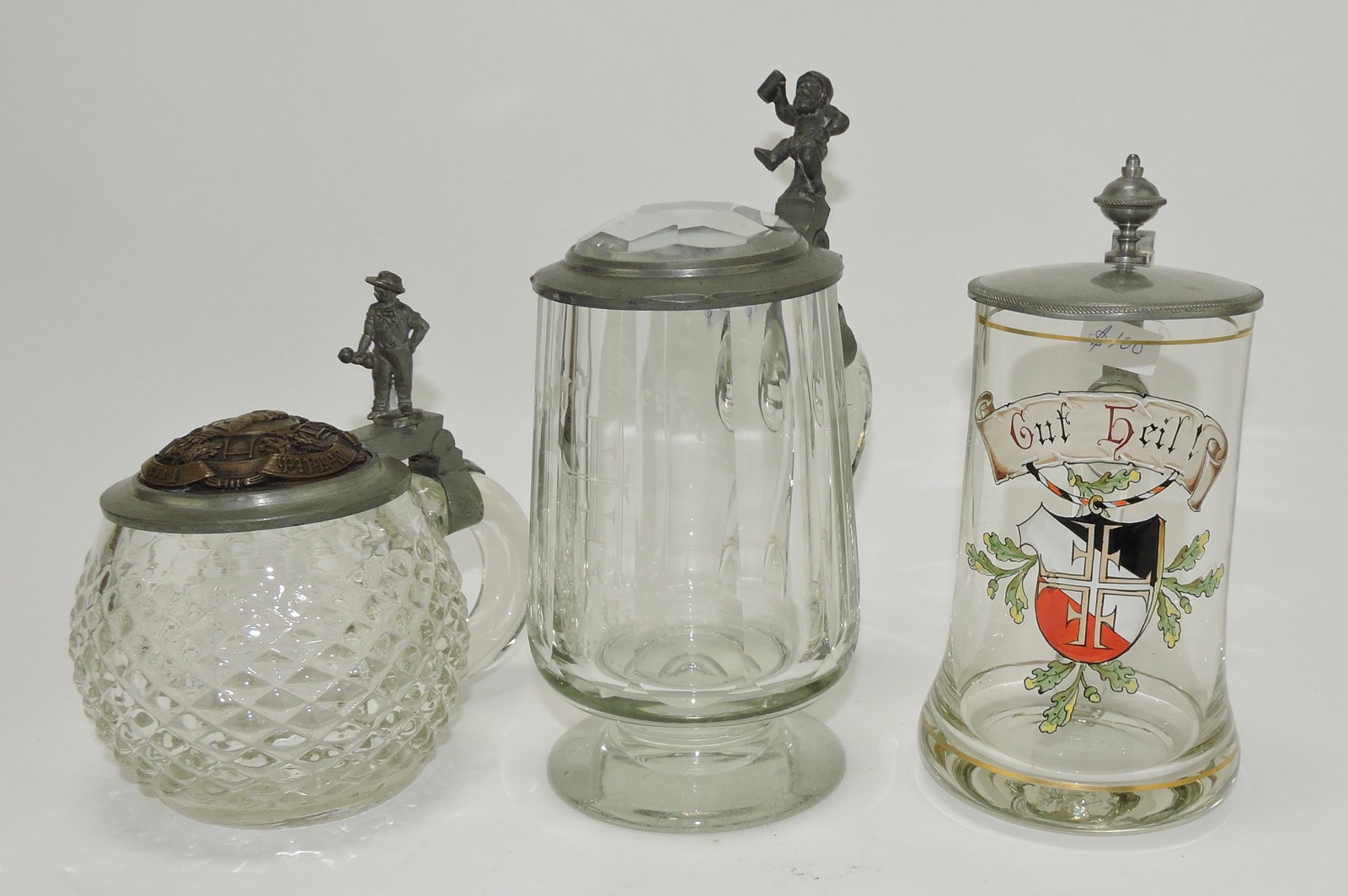 Lot of 3 glass steins: .