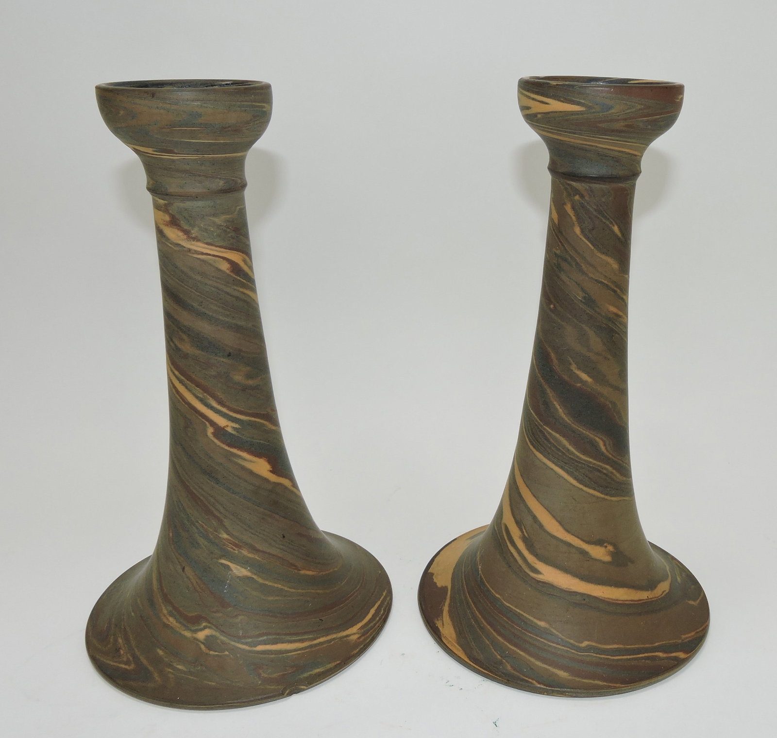 Niloak Mission Swirl 10" pair of candle: holders, chip to base rim of one