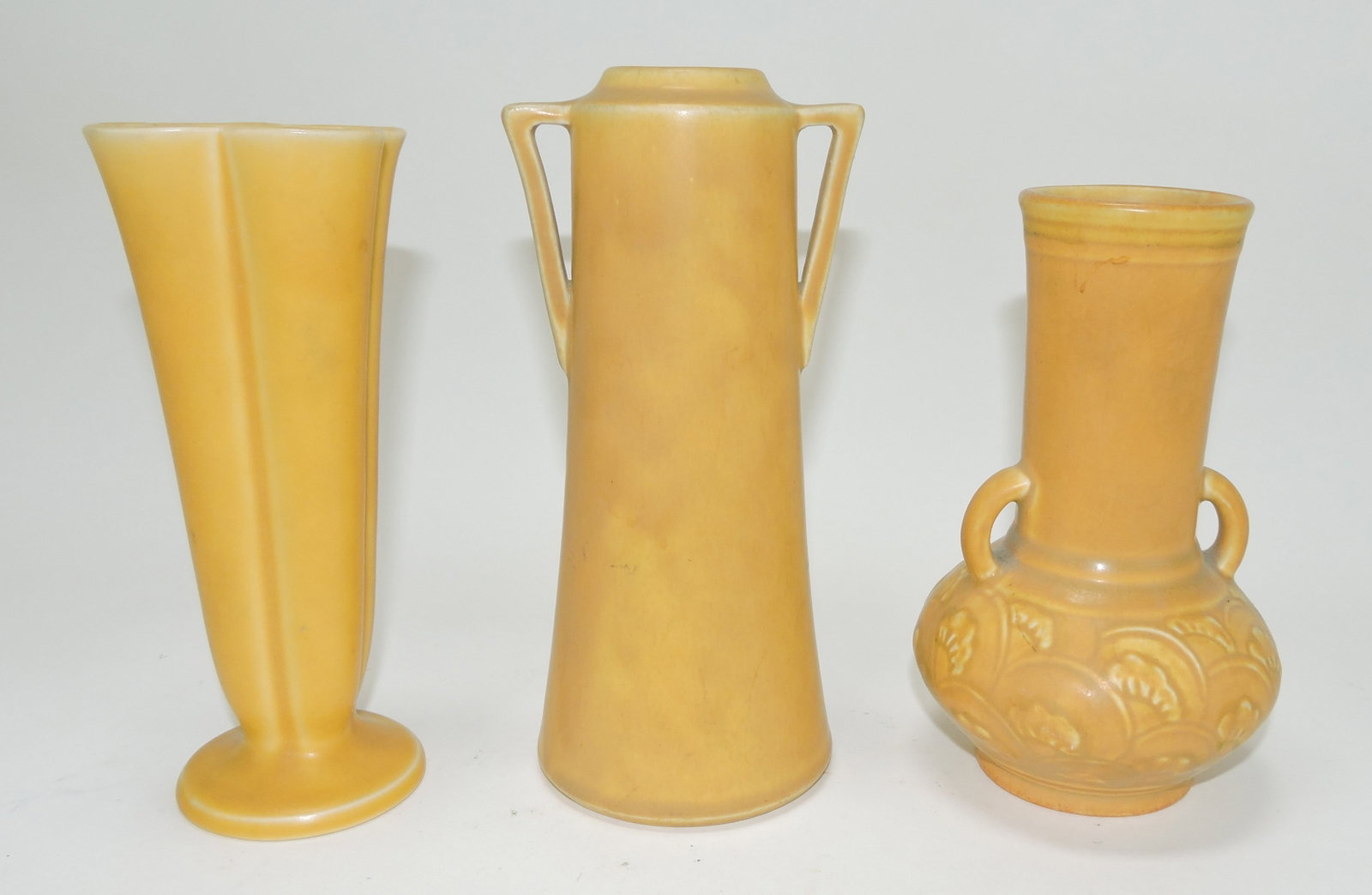 Rookwood lot of 3 yellow vases:: #2976 1932, 6 1/4'; #2018 1919, 7" (hairline); #6102 1930, 6"