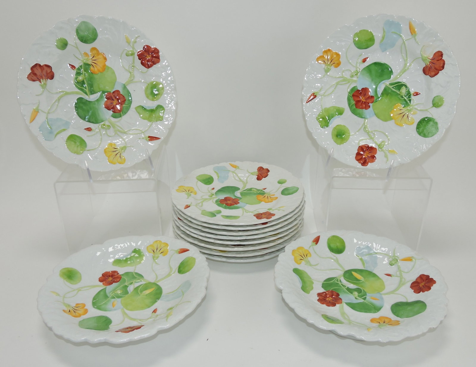 Minton porcelain Nasturtium 12 piece: dessert set with 2 low comports and 10 - 9" plates, rim nick to one comport, hairline to one plate, crazing to one plate