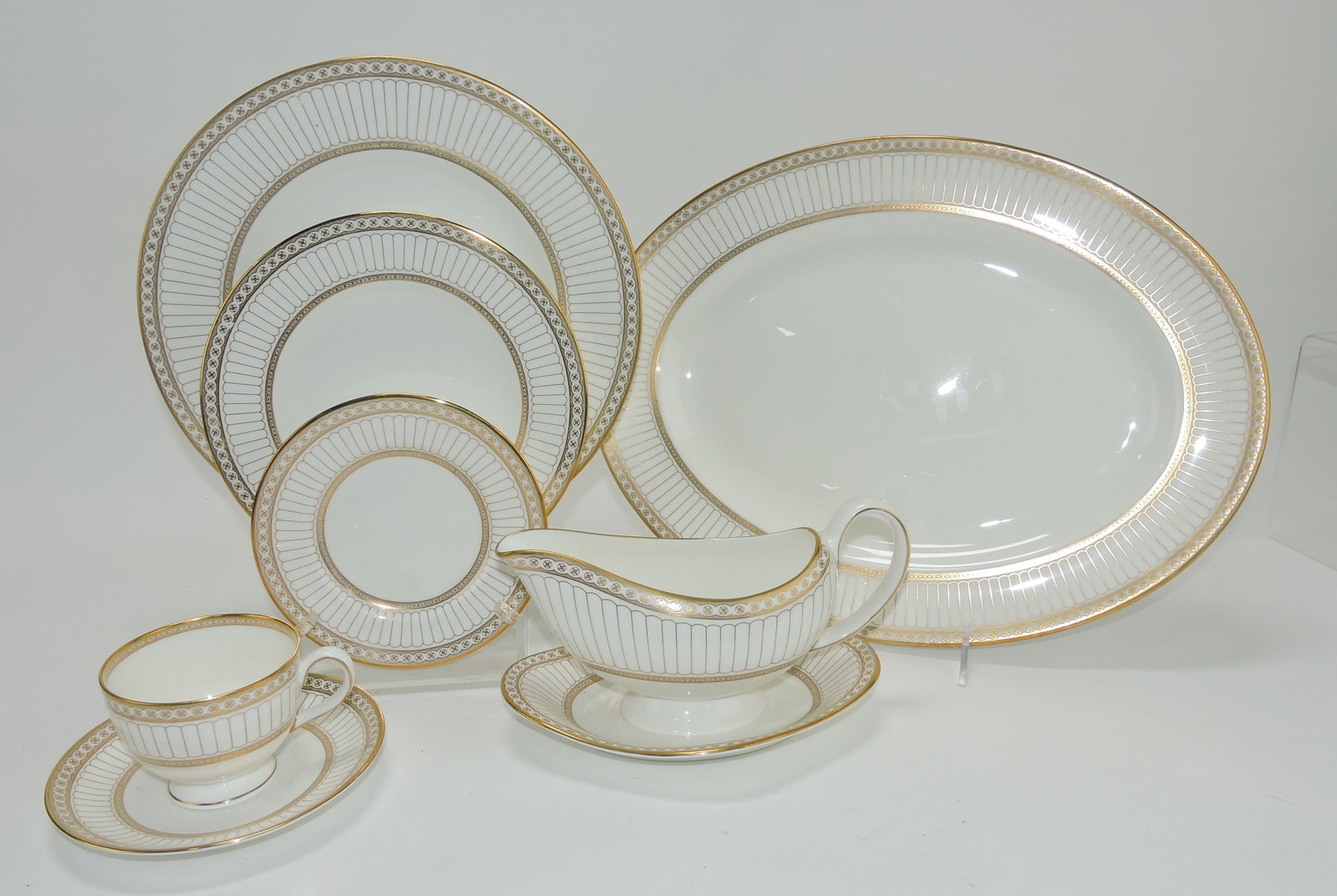 Wedgwood Colonnade set of china:: 11 - 10 3/4", 12 - 8", and 12 - 6" plates, 12 cups and saucers, sauce boat and 15" platter