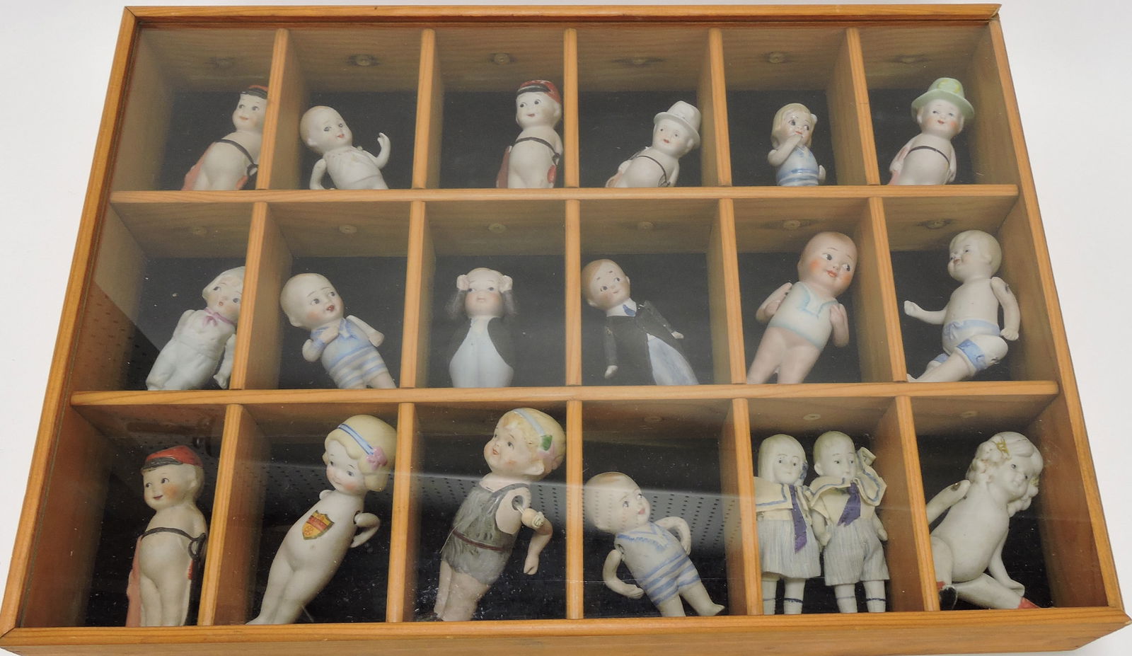 Nippon bisque lot of 19 dolls: .