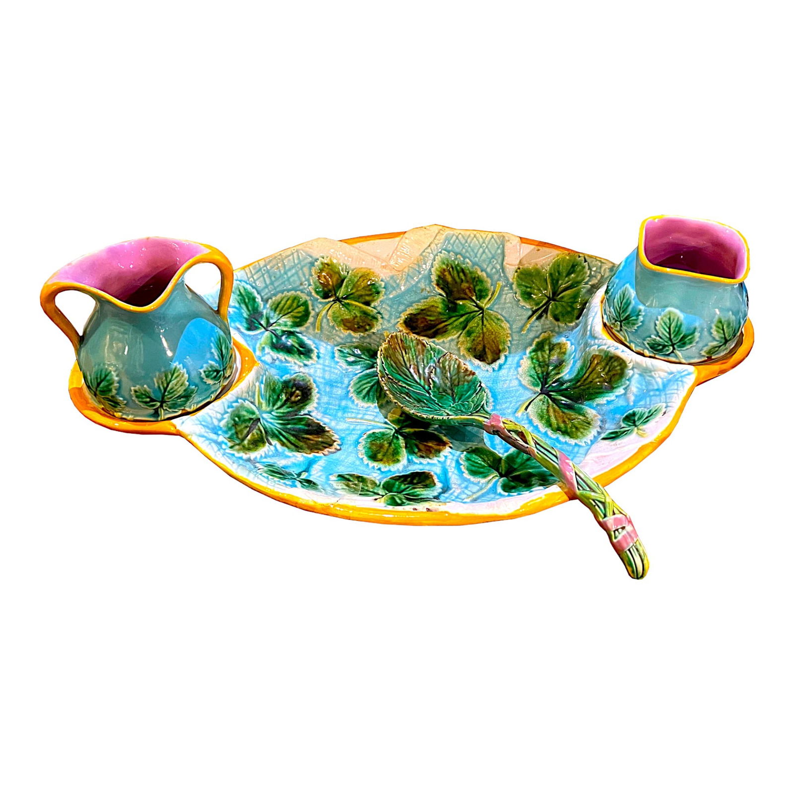 George Jones Majolica ‘Napkin: Strawberry dish with cream and sugar holders and ladle c.1875. The oval tray with a turquoise napkin strewn with strawberry leaves, the turquoise pots with a band of strawberry leaves to the centre. L