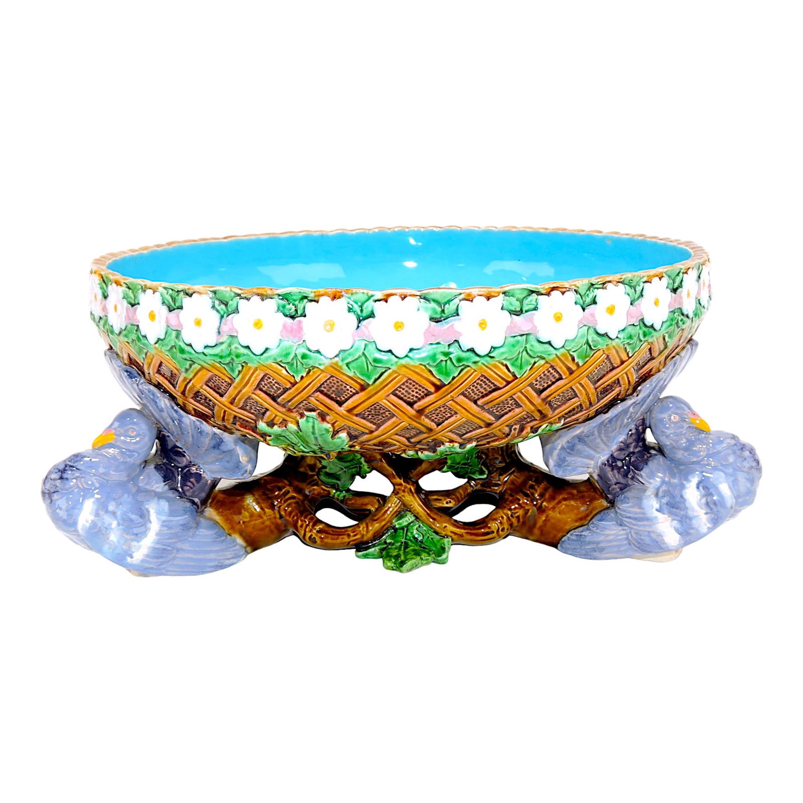 Minton majolica wicker bowl with: daisy chain rim supported by 3 pigeons, 13 1/2"w, 6"h, professional repair to leaves on base, shape no. 874
