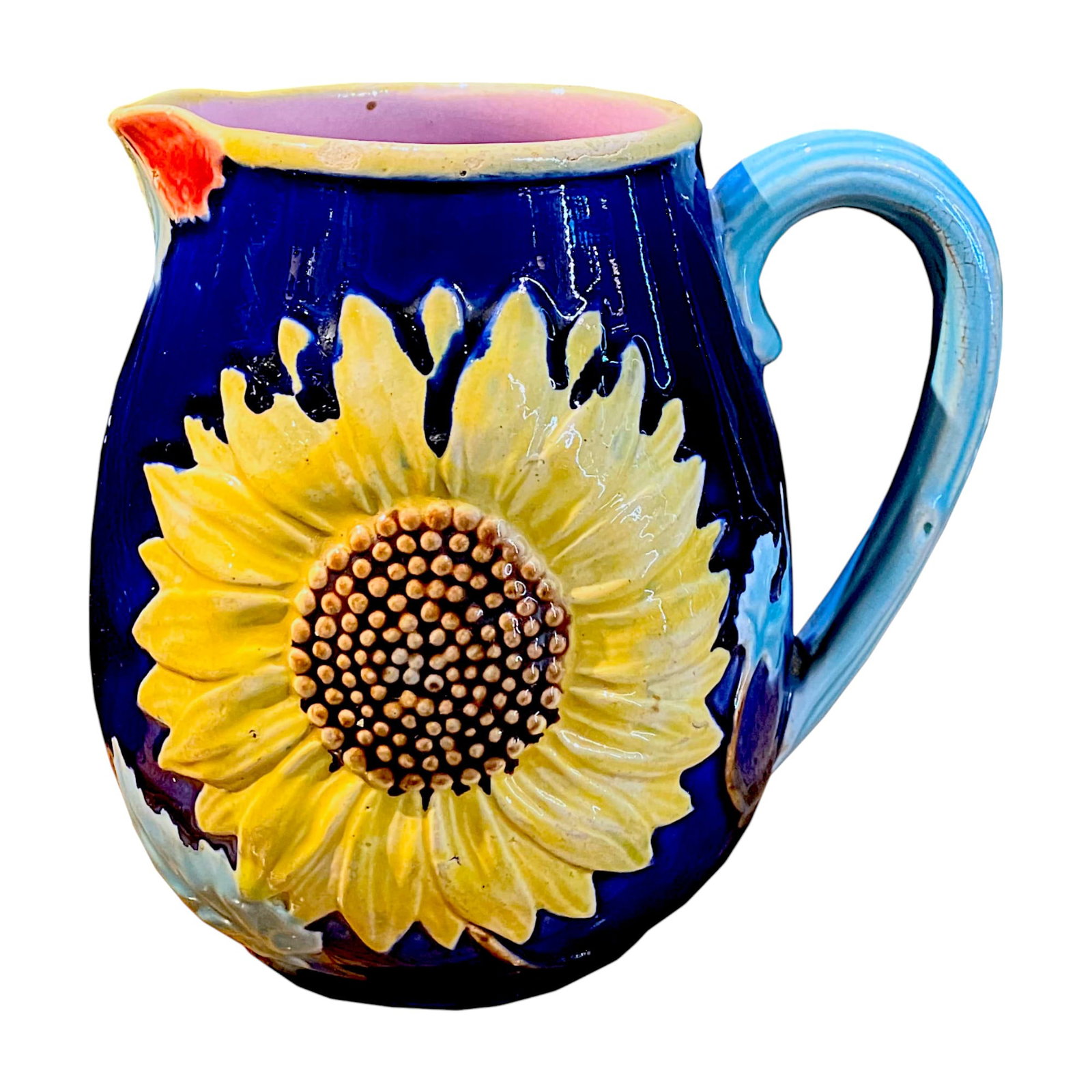 James Wardle Majolica Aesthetic: Movement Sunflower Pitcher c.1880. The cobalt blue body with a large sunflower to back and front with a butterfly forming the lip with a turquoise lug handle. Height: 6 inches Provenance: Nick Boston