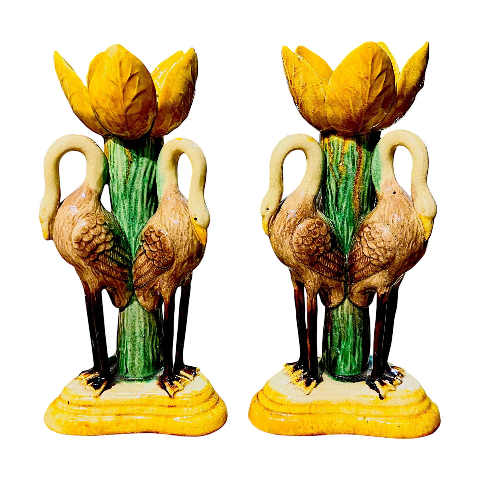 Rare Pair of Manual Mafra Majolica: Heron Candlesticks c.1875. Each modelled as three back to back heron around a green leaf pedestal, the dip pans formed as lily leaves all upon trefoil pedestal bases. Height: 9 inches Provenance: Nick
