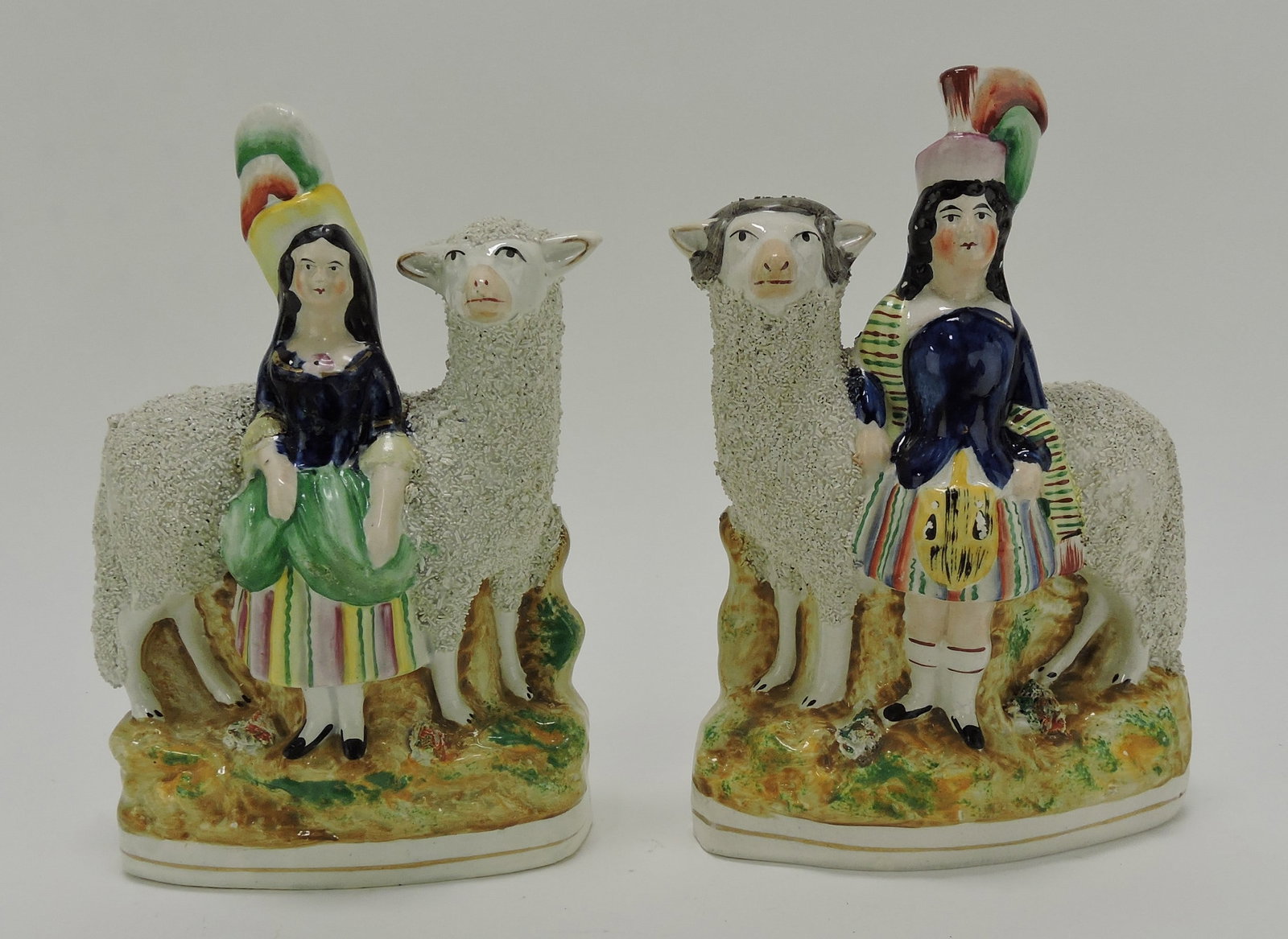 Staffordshire pair of sheep with Royal: children, 9"