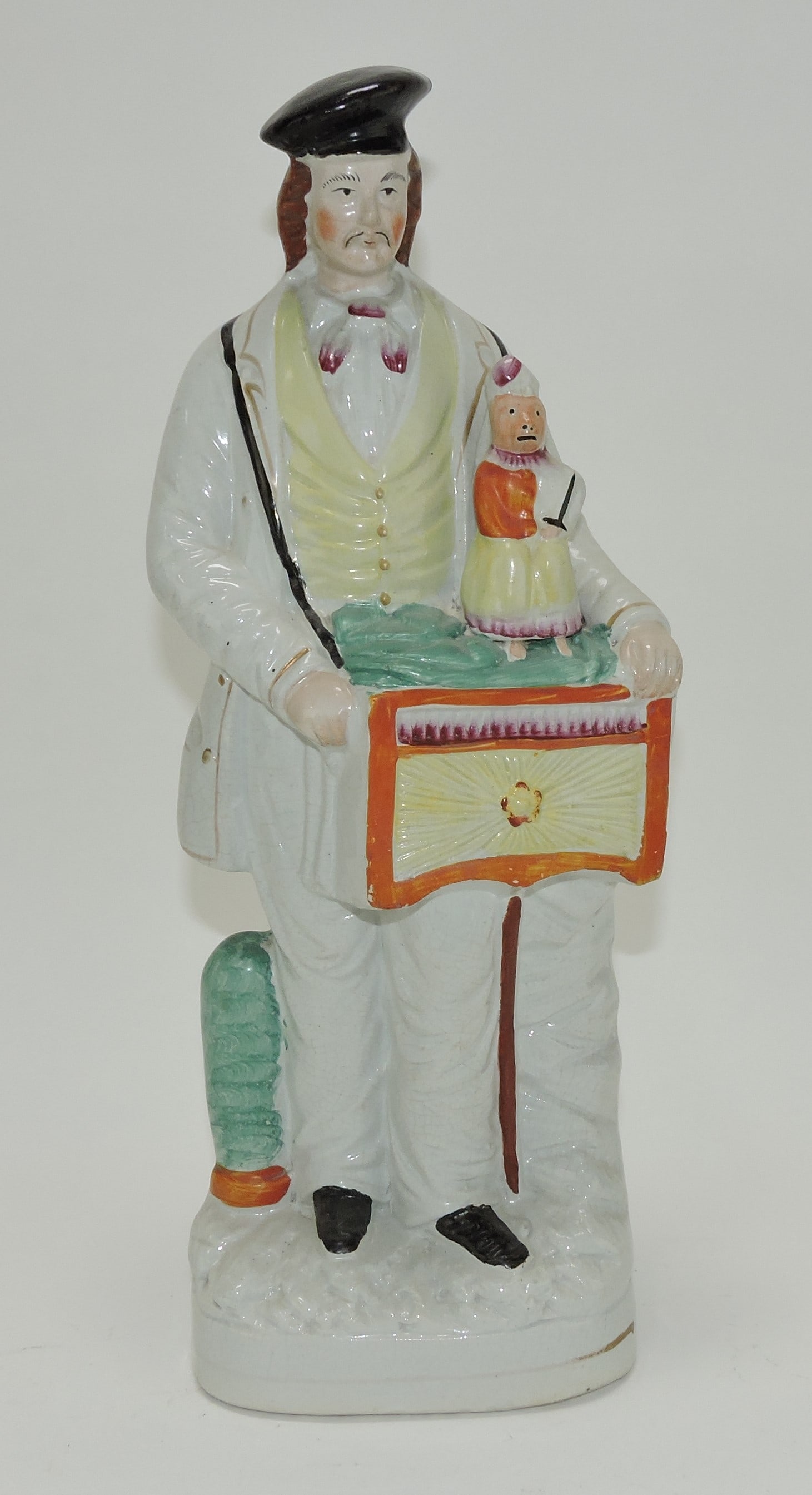 Staffordshire figure of organ grinder,: 15 1/2"