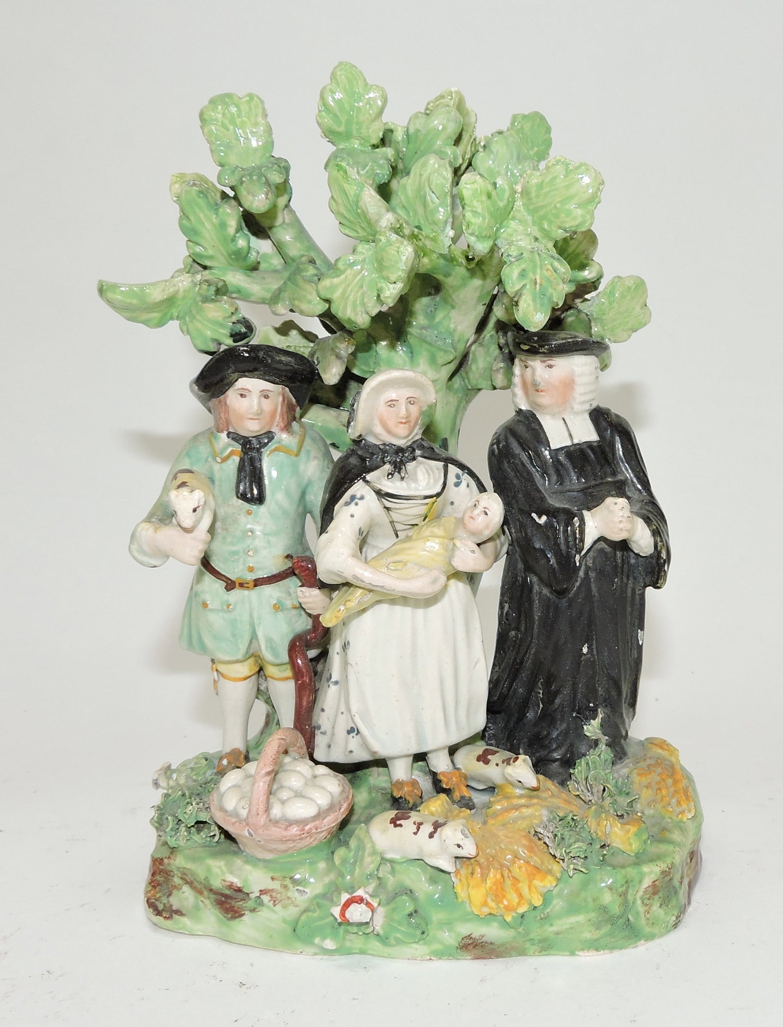 Staffordshire Pearlware figural group,: 7", with bocage, losses and repairs
