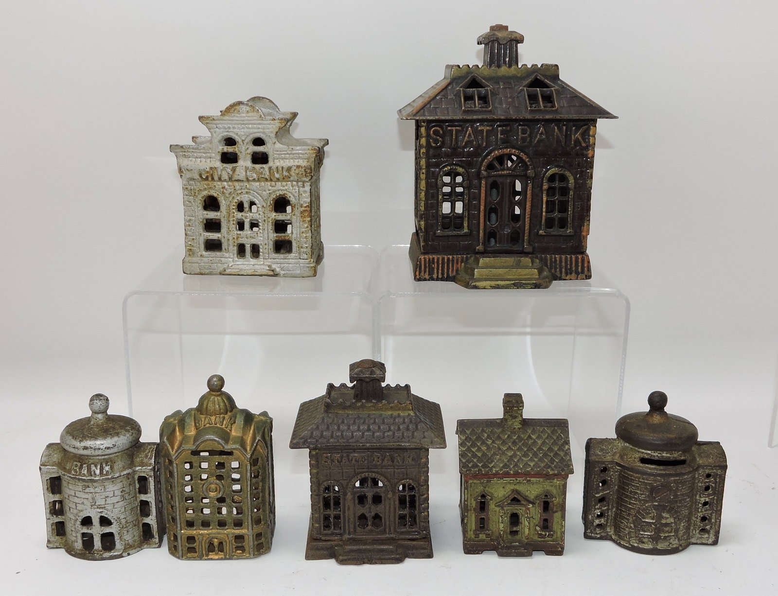 Cast iron lot of 7 building banks (1 of 1)