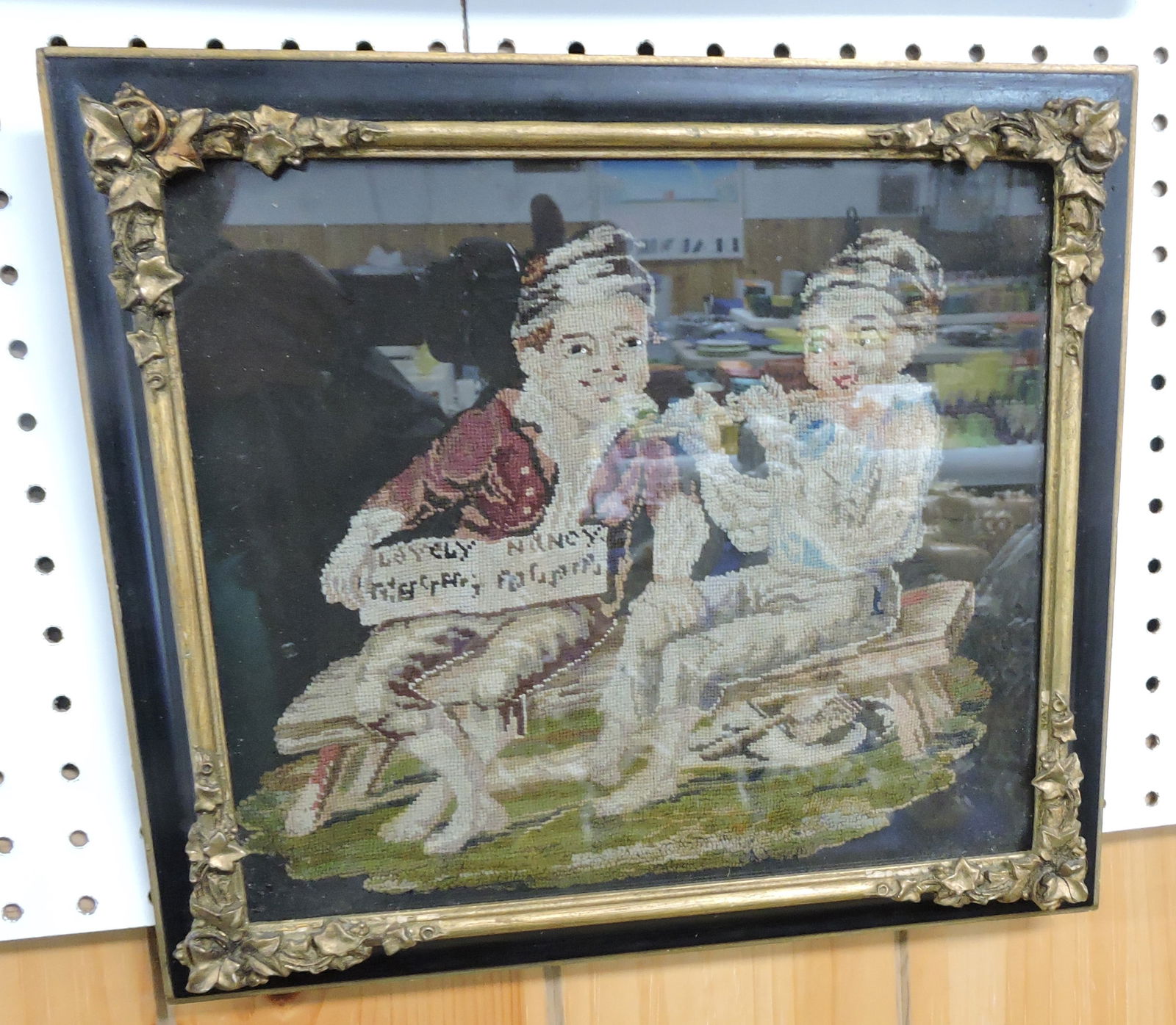 Needlework picture of two boys on bench, (1 of 1)