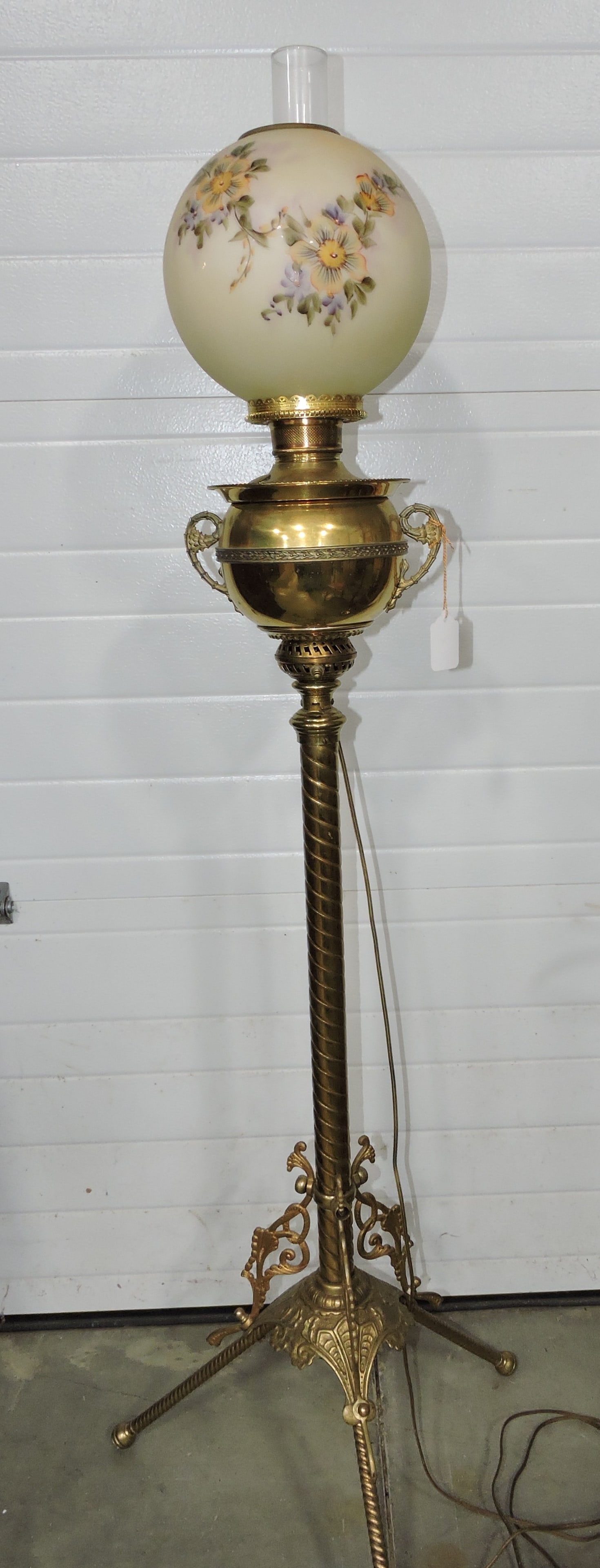 Brass organ lamp with floral shade: .