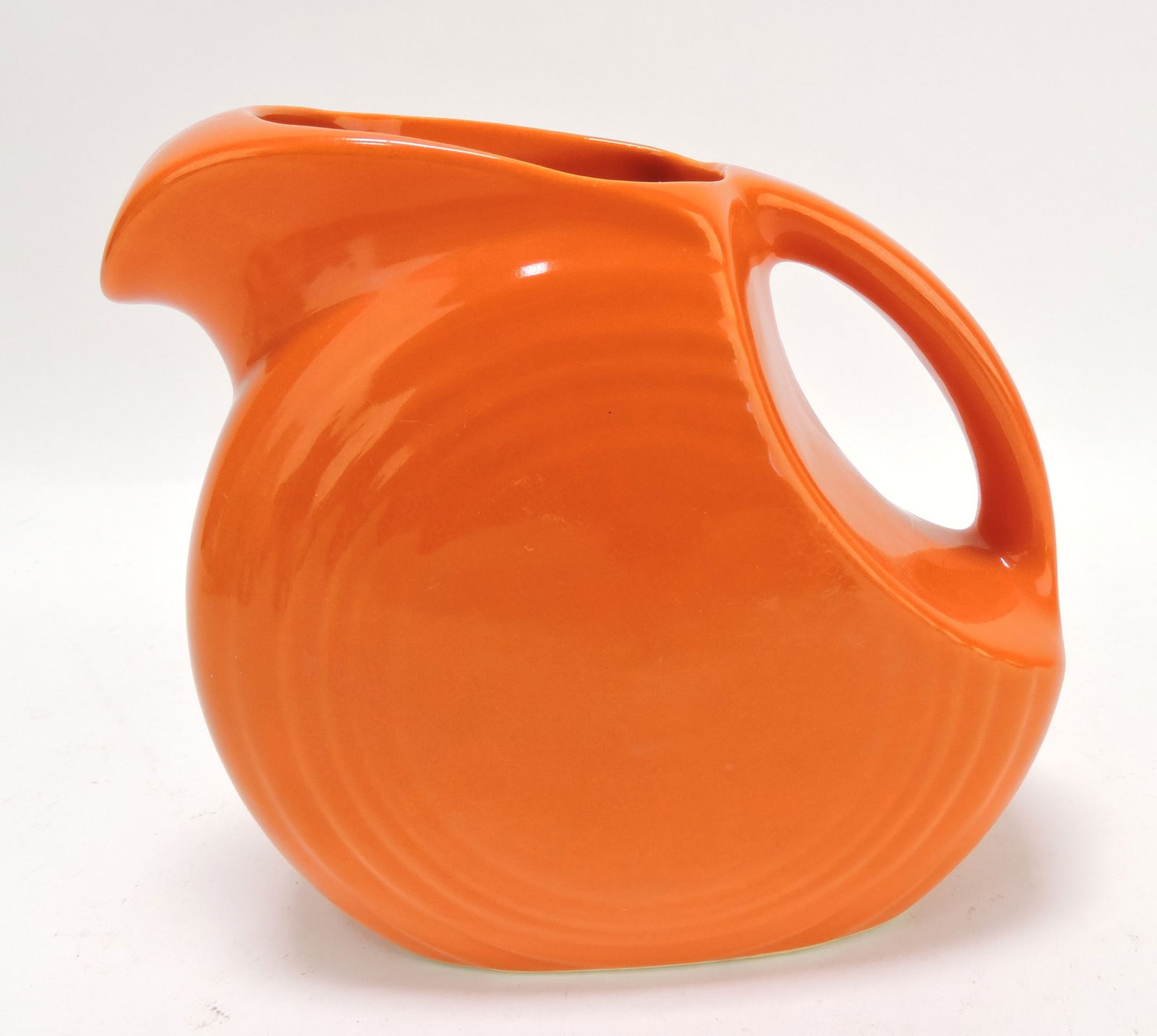 Fiesta juice pitcher, red, hairline (1 of 1)