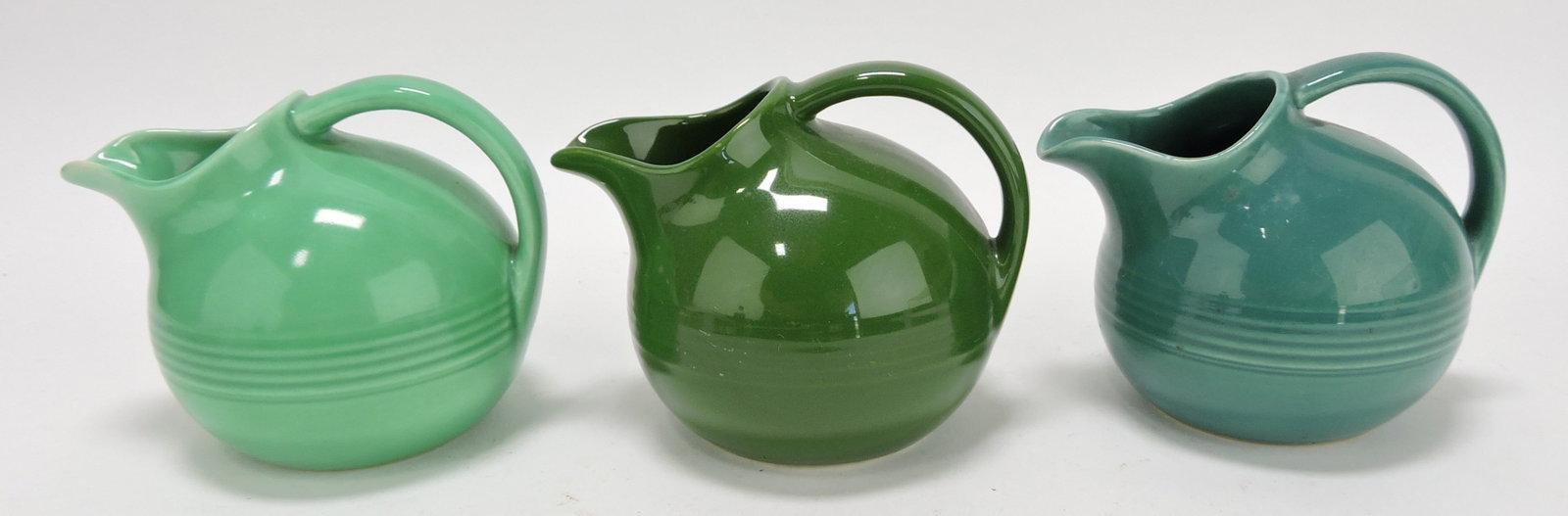 Harlequin novelty creamer group: green,: dark green, spruce green (spout nick)