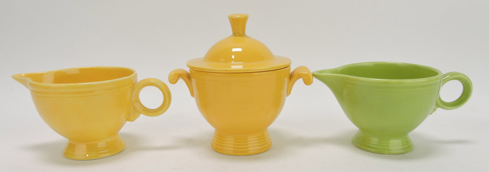 Fiesta cream & sugar, yellow, AND: chartreuse creamer