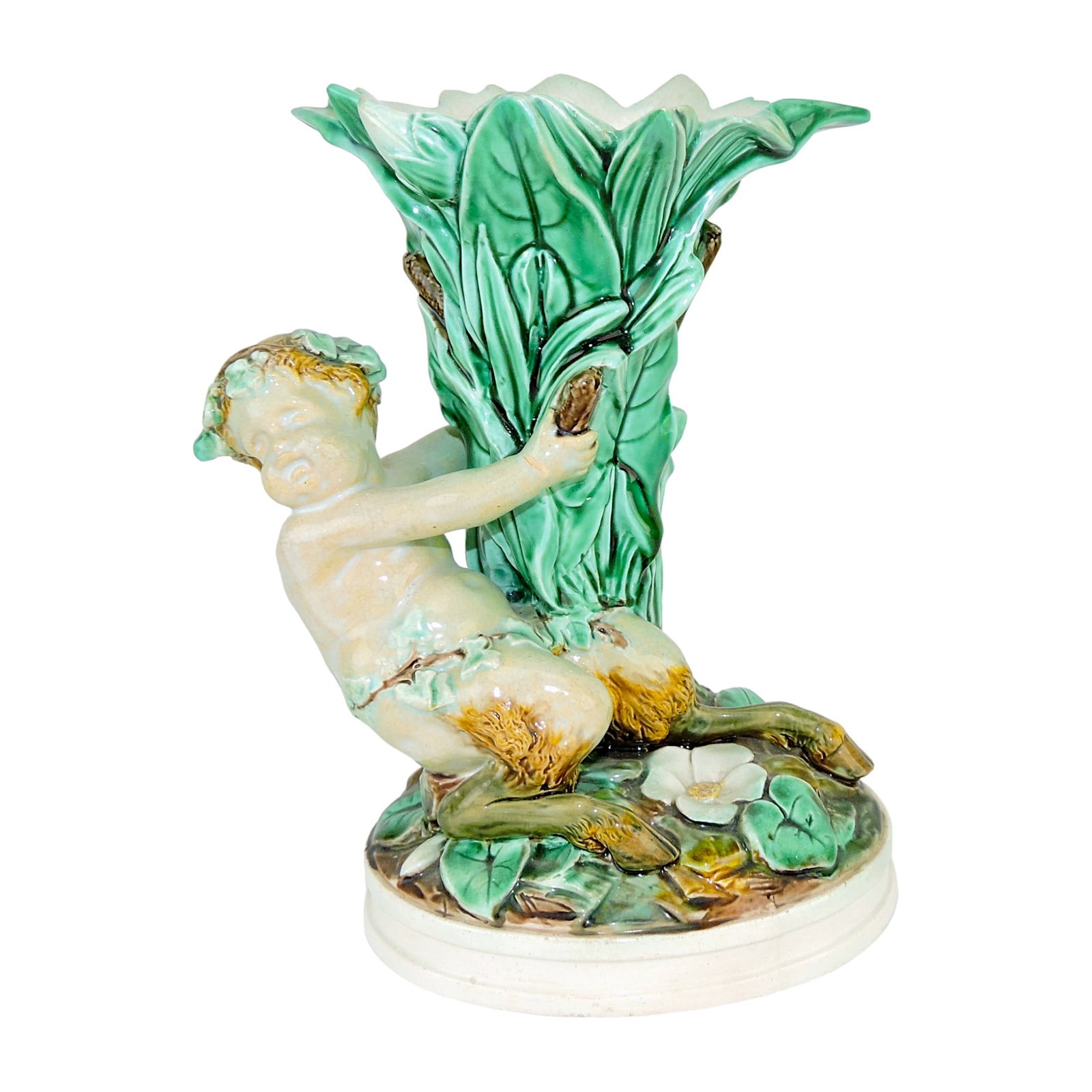 Wedgwood Majolica Satyr Vase c.1865,: modelled as a satyr holding a large bunce of leaves and cattails, all upon a oval pedestal base; professional repair to leaf points, 8" Catalogued and curated by Nicolaus Boston. Flower Family Collect