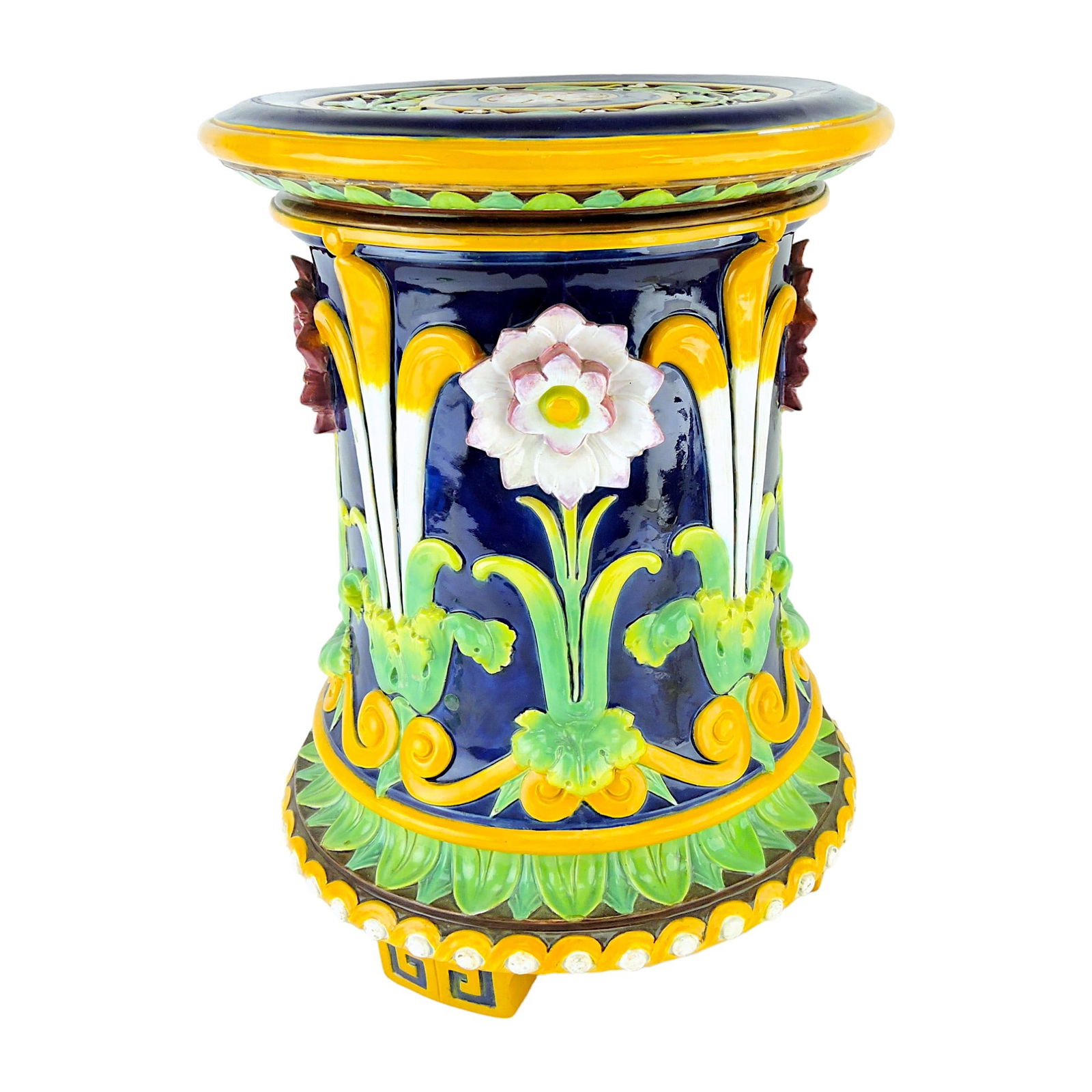 Minton Majolica Tudor Rose and: Prince of Wales Garden Seat c.1870, of waisted cylindrical form, molded in relief with alternating stylized Tudor Rose and Prince of Wales feathers, all above a scroll border, above stiff leaf tips an