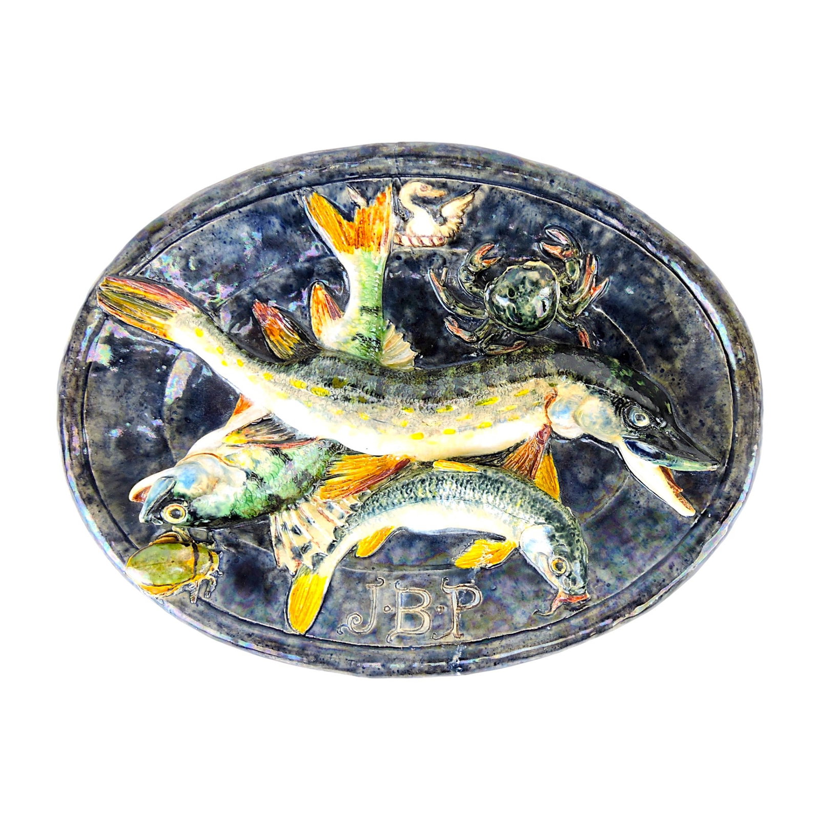 An Important and Powerful Charles: Avisseau Majolica Palissy Plaque dated 1869, the oval plaque with three piled, plump large fish with a beetle and crab, the border inscribed J.B.P and a swan crest. 10 1/2" x 8" Catalogued and curated