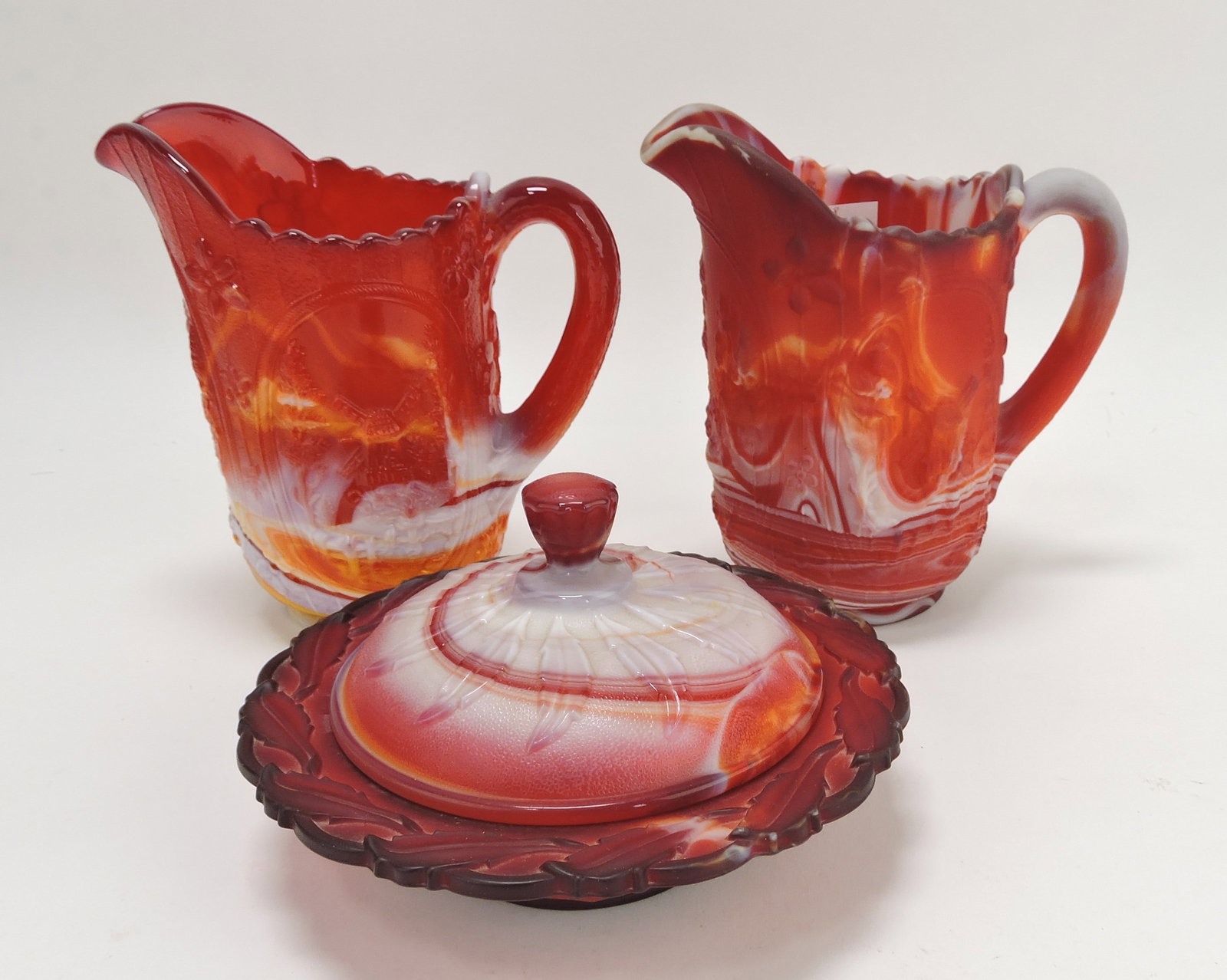 Imperial Glass red slag lot of: 2 pitchers and butter dish