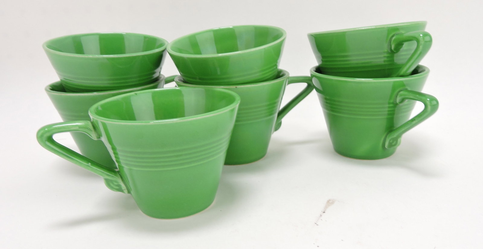 Harlequin cup group, 7 medium green: .