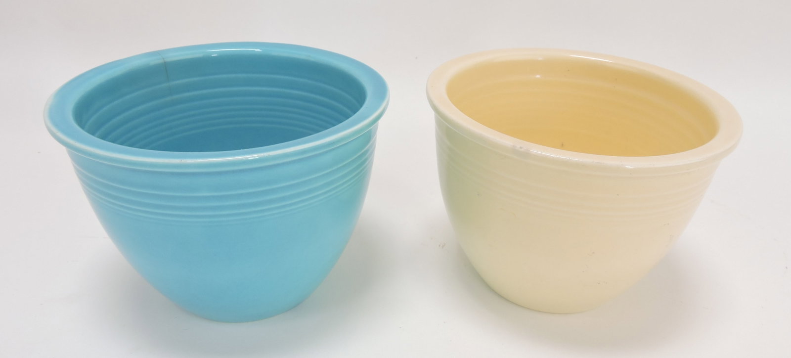 Fiesta #1 mixing bowl group:: turquoise (hairline) and ivory (rim nick)