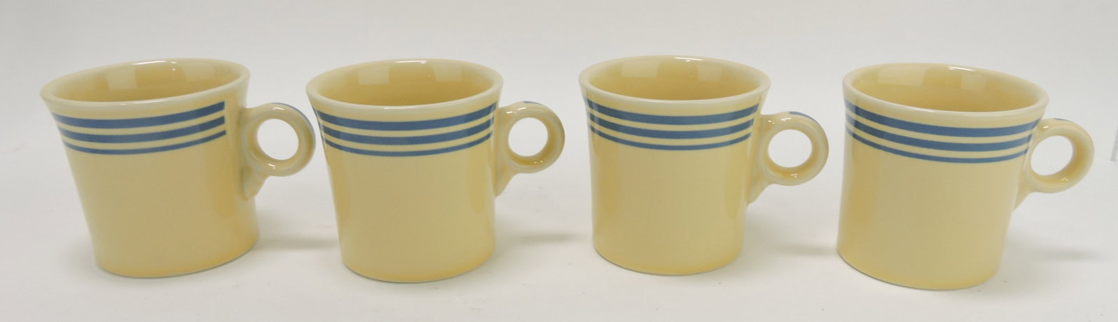 Fiesta Post 86 blue stripe set of 4 mugs: .