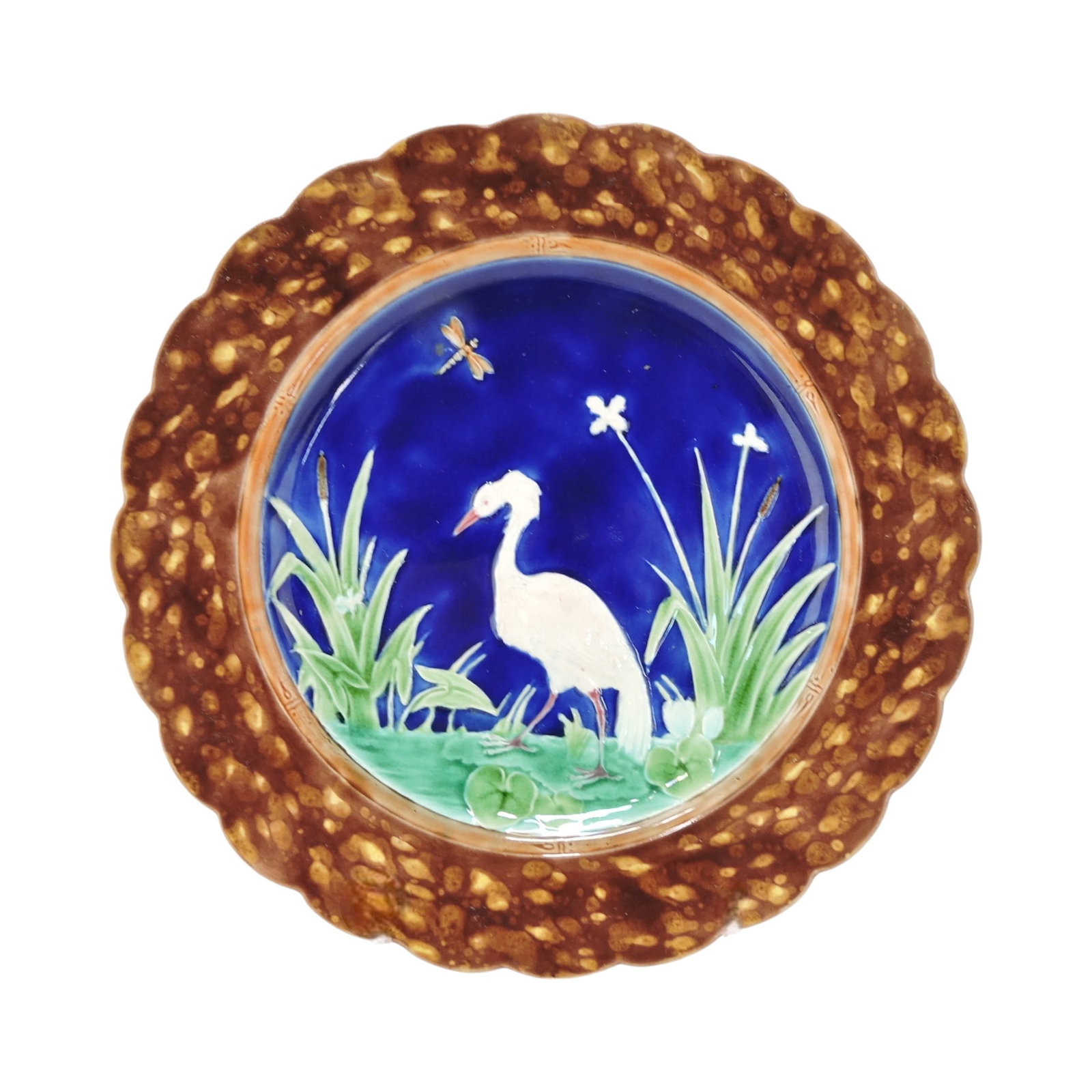 Wedgwood majolica stork in marsh: plate with cobalt ground, 9 1/4"; The Leberfeld Collection