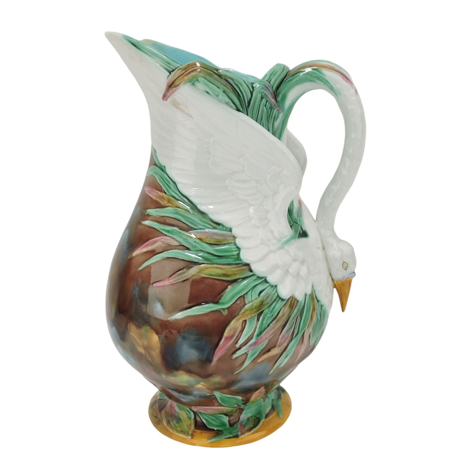 Wedgwood majolica mottled swan: pitcher, 13", base foot rim and spout repair. Ref: Majolica Mania Vol 1 pg 21; The Leberfeld Collection. This example was exhibited in the exhibition 'Majolica Mania', Bard Graduate Center, New York,