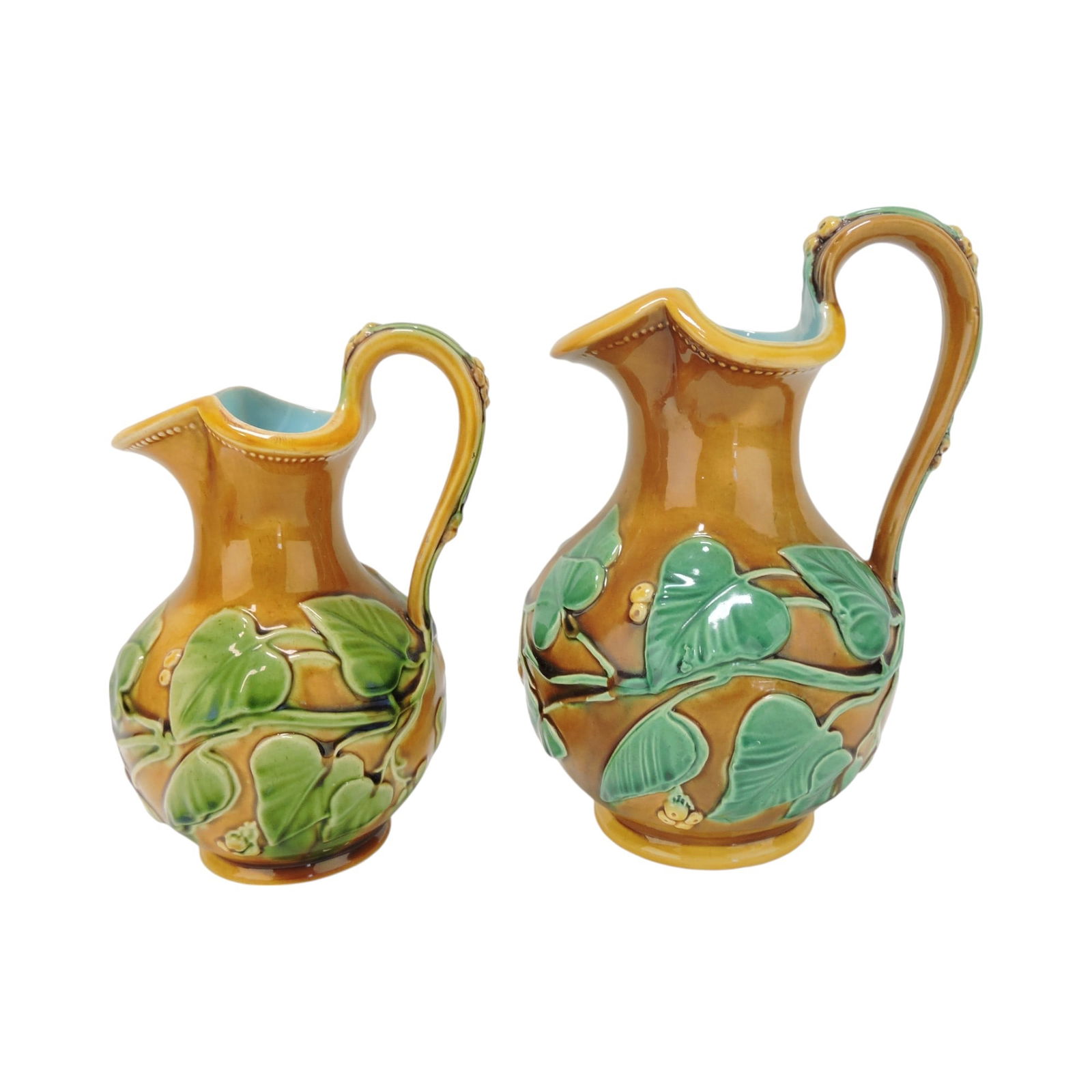 Minton majolica lot of 2 ivy jugs,: 8 1/2" (professional spout repair), and 7"; The Leberfeld Collection