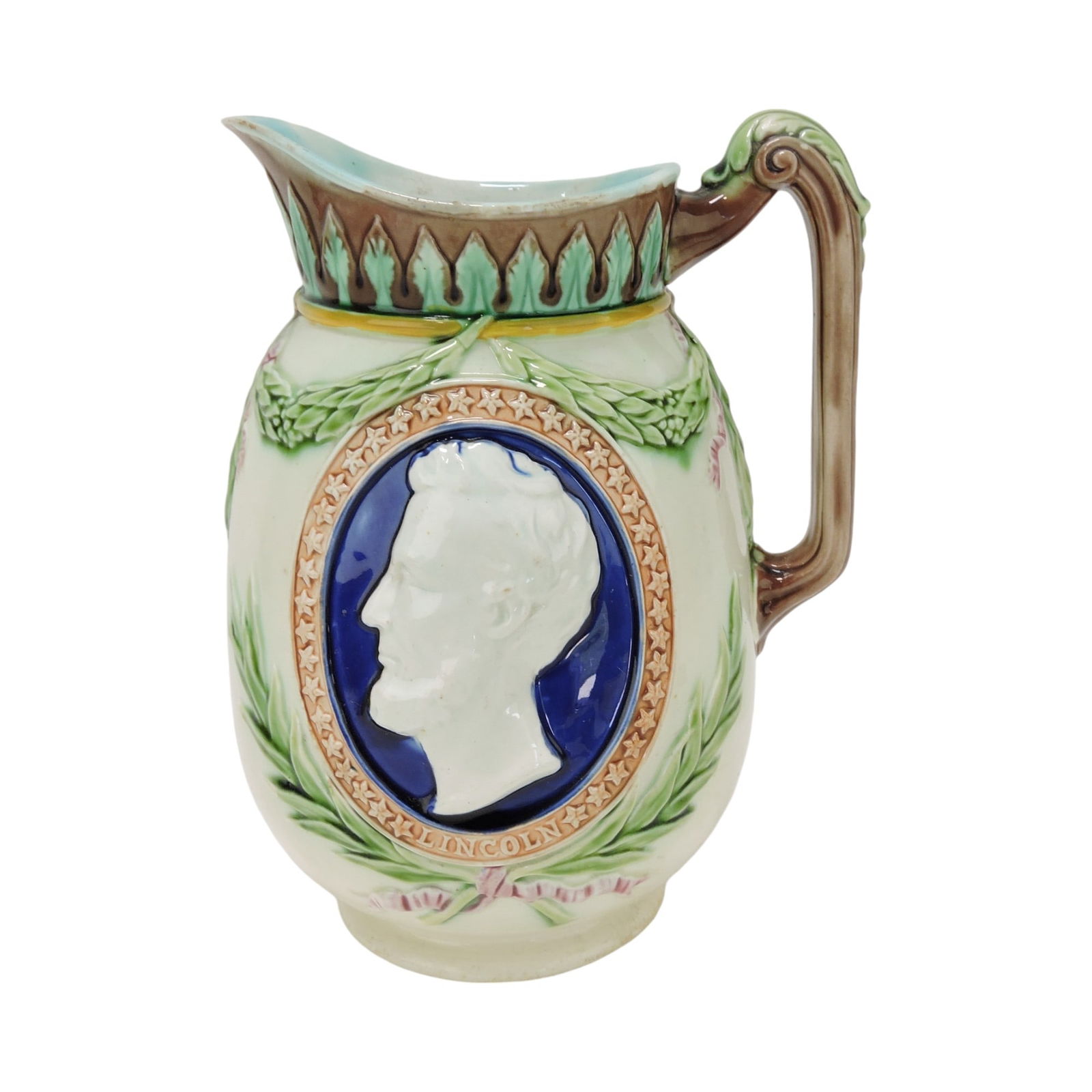 Wedgwood majolica centennial pitcher: with George Washington and Abraham Lincoln in oval cobalt frames on each side, 8"; The Leberfeld Collection