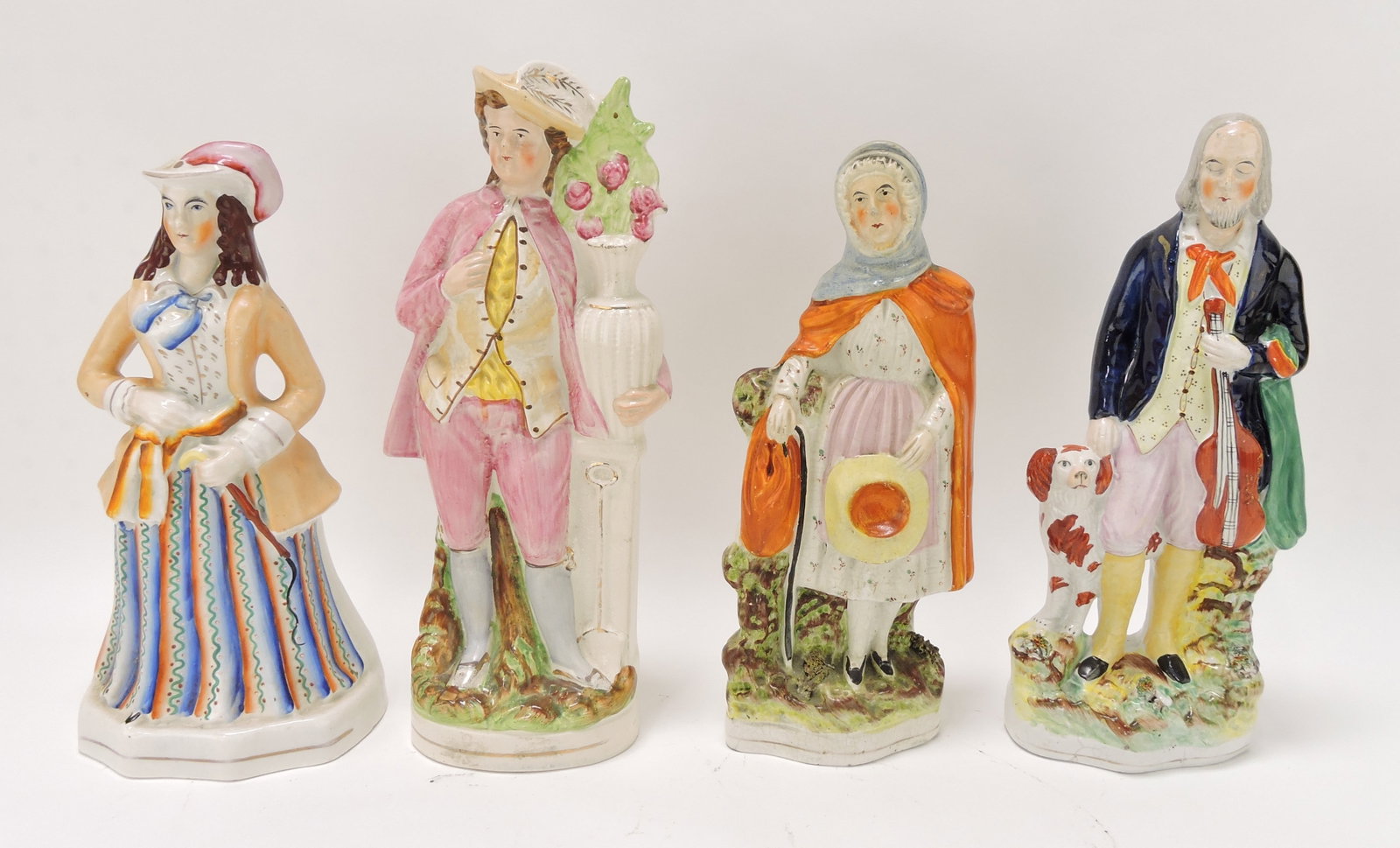 Staffordshire lot of 4 figures 11 to 12",: various condition