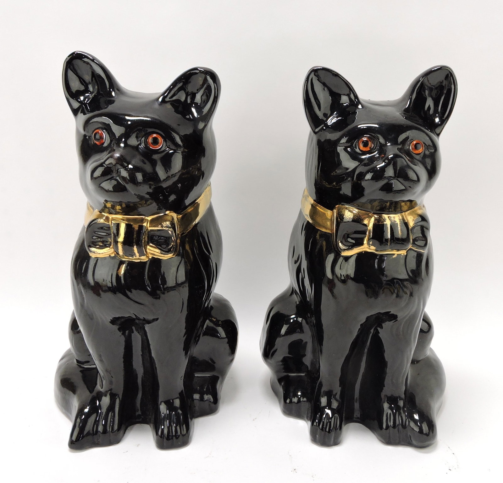 Staffordshire Sadler pair of Jackfield: black cats with glass eyes, 12"