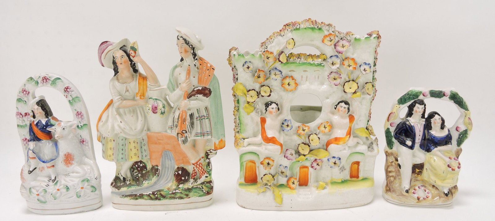 Staffordshire lot of 4 figures, 7 to 11",: various condition