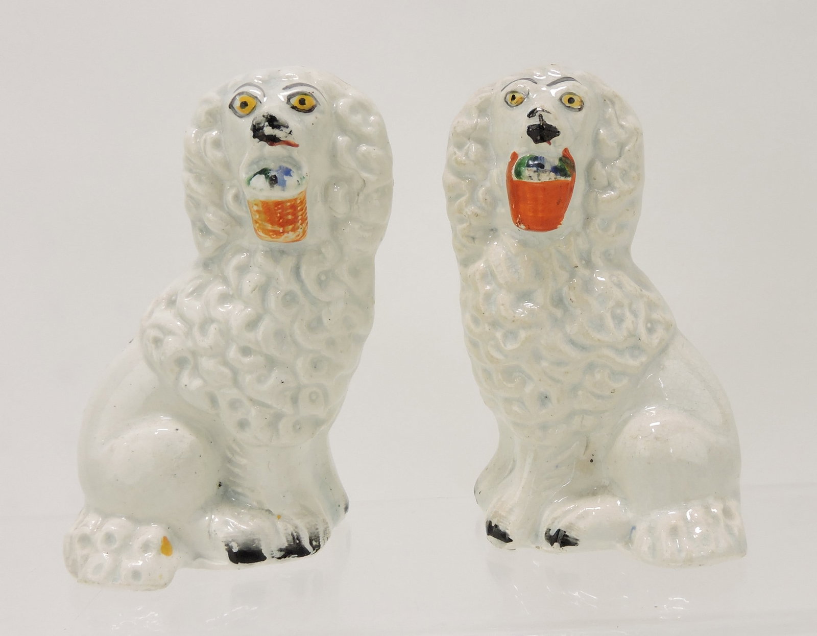 Staffordshire pair of flower basket dogs,: 4"
