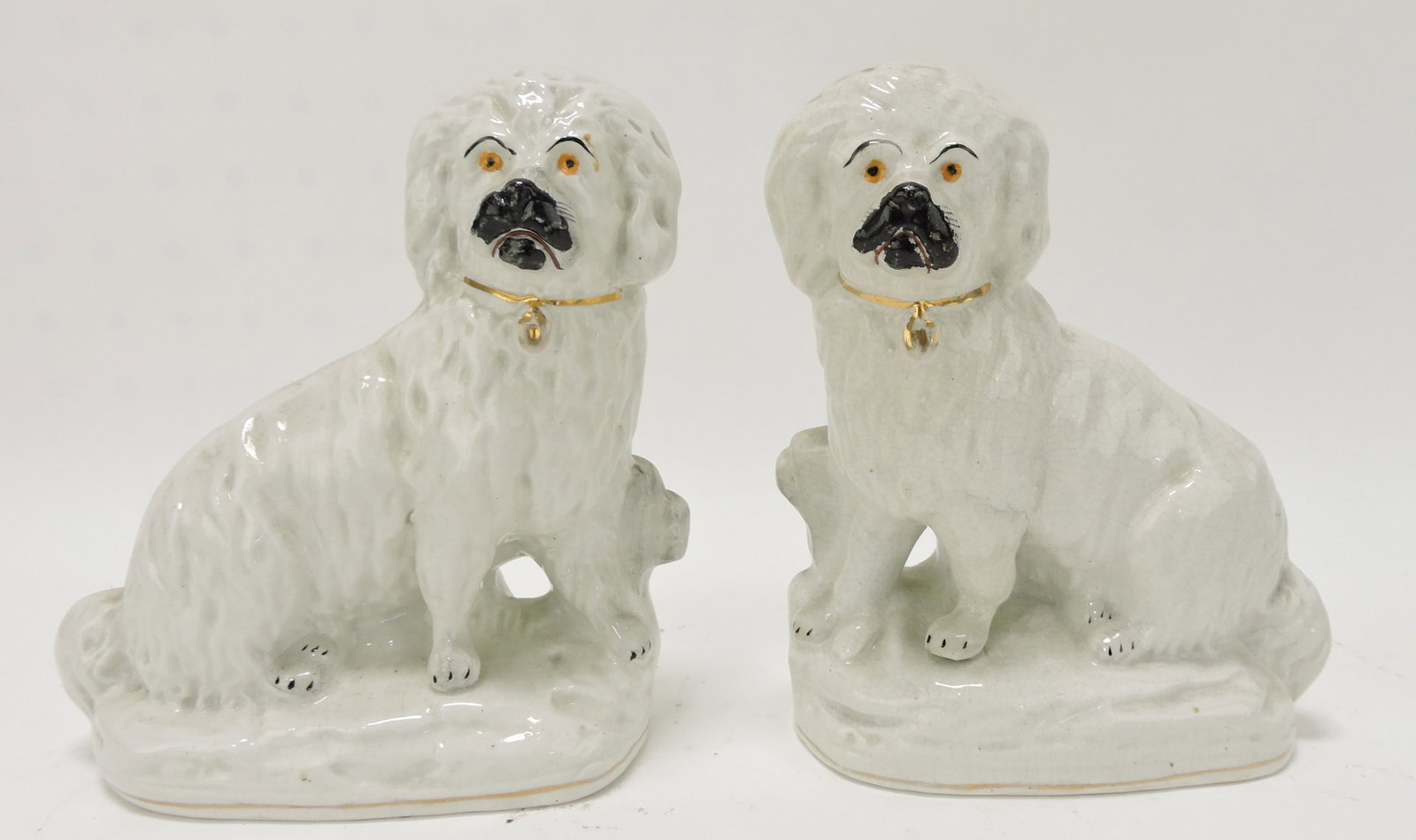 Staffordshire pair of Maltese dogs by: fence figures, 6 1/4"