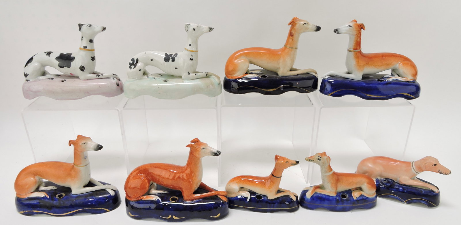 Staffordshire lot of 9 whippet pen holders: .