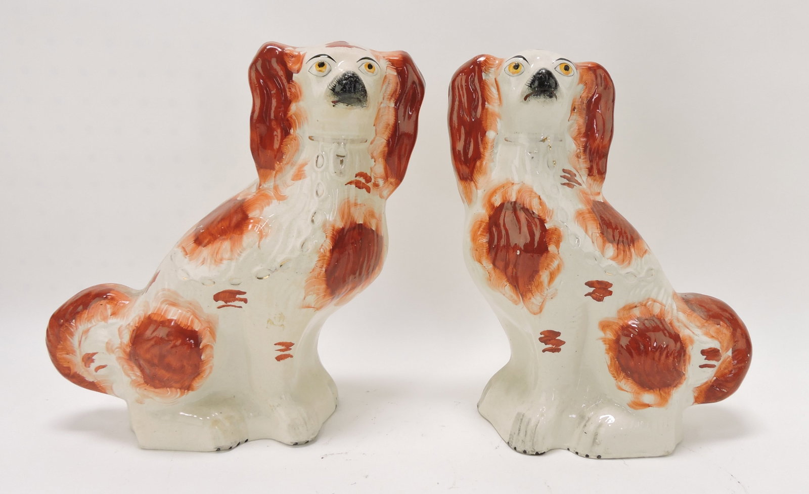 Staffordshire pair of russet spaniels,: 11"