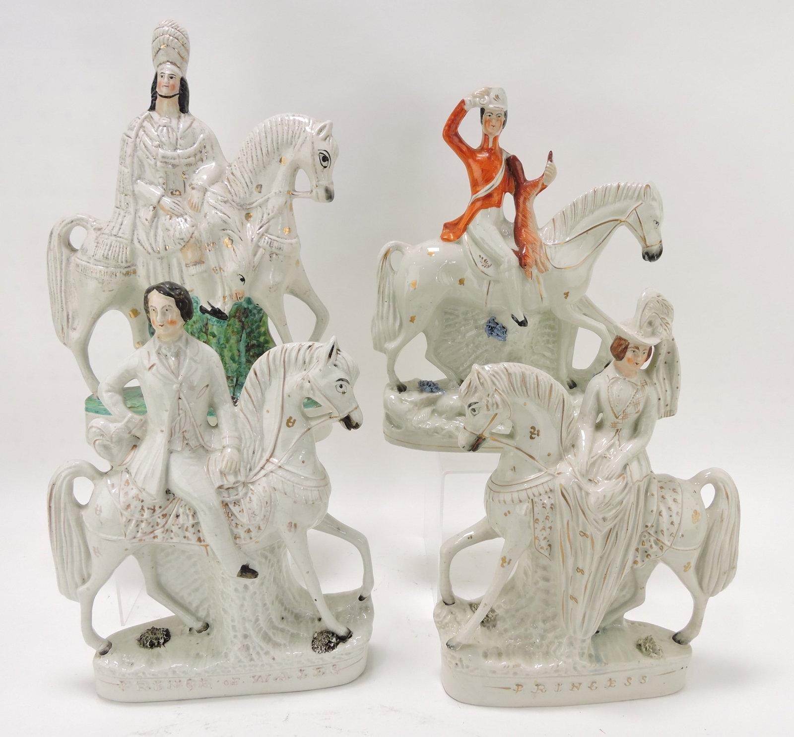 Staffordshire lot of 4 equestrian: figures, 13 to 14"