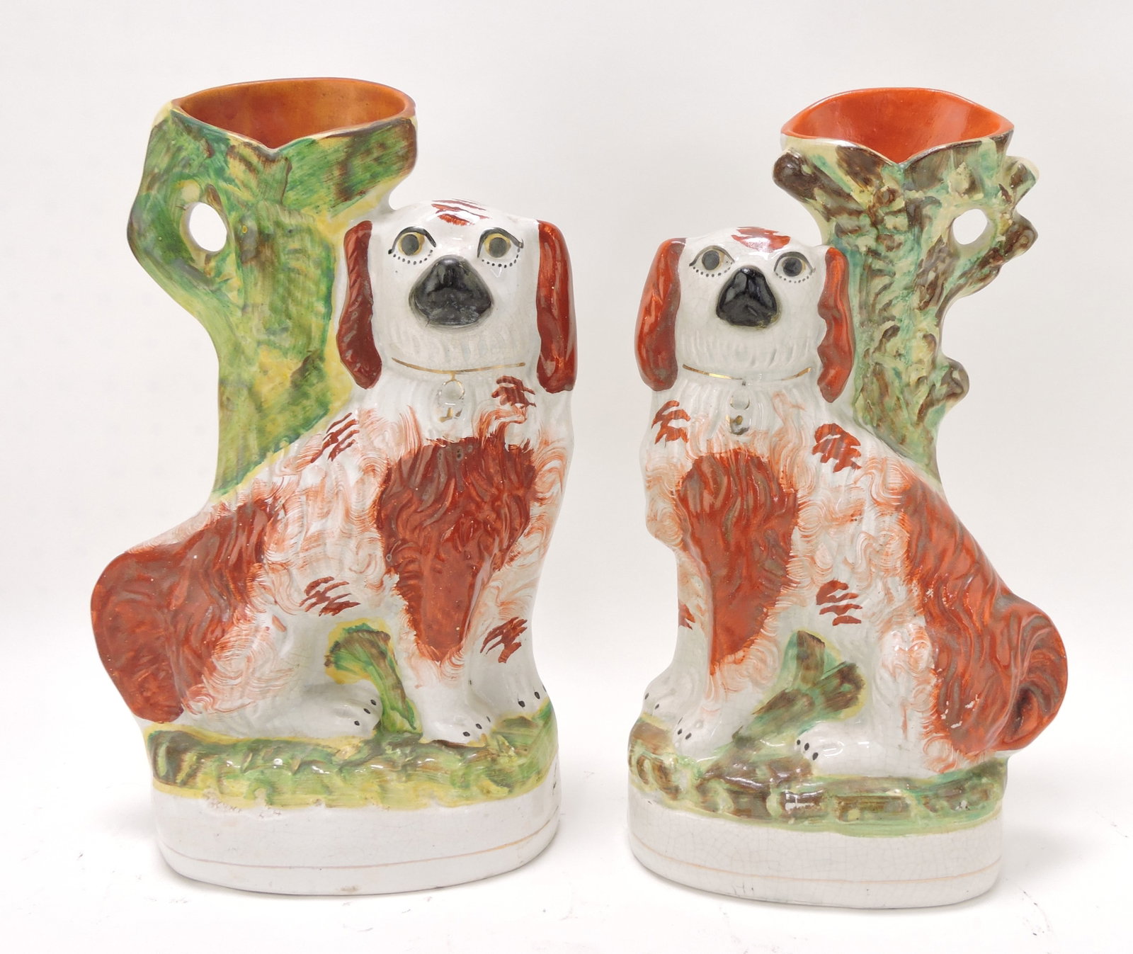 Staffordshire pair of russet spaniel: spill vases, 13"